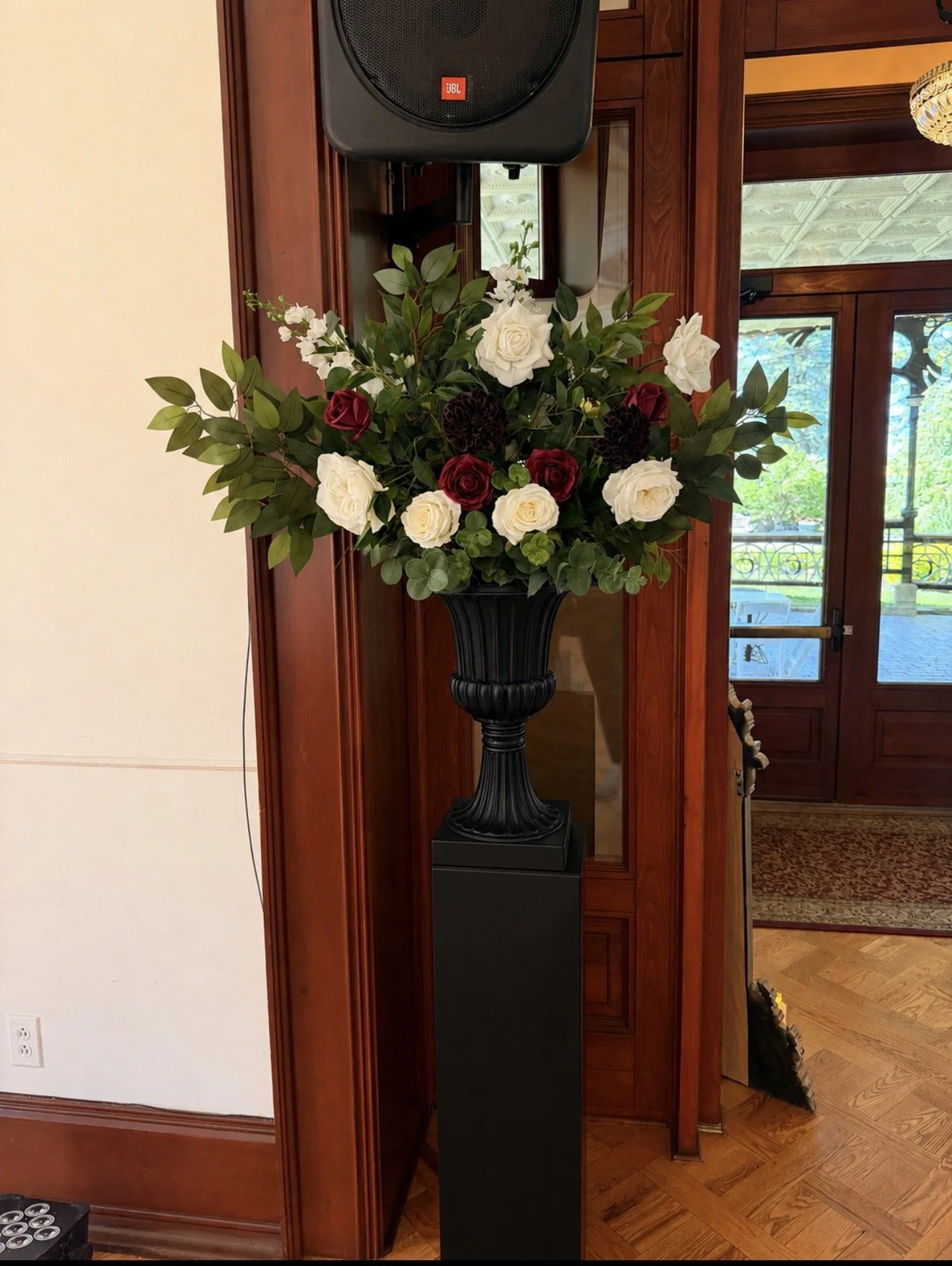 2 floral Urns with columns