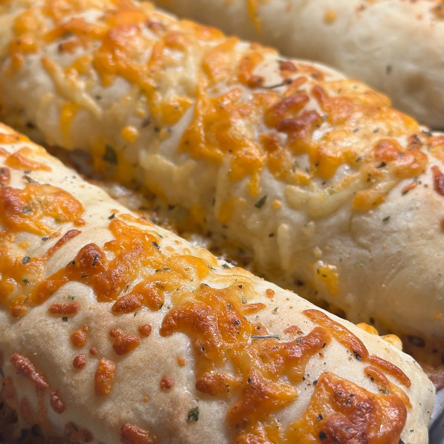 Stuffed Cheese Sticks

There&rsquo;s something so irresistible about pulling apart a warm, golden cheese stick (that you just pulled out of your oven) as you watch the warm gooey cheddar and mozzarella stretch&hellip;trying to wait for them to cool o