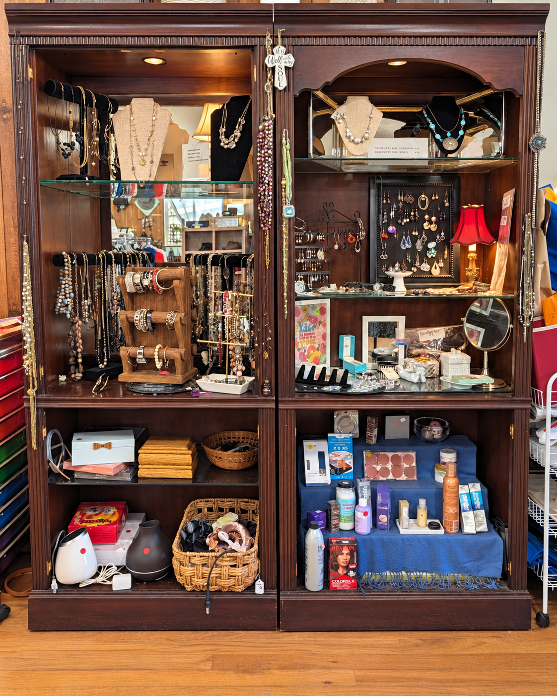 Jewelry and accessories displayed in wooden cabinets at ECCO