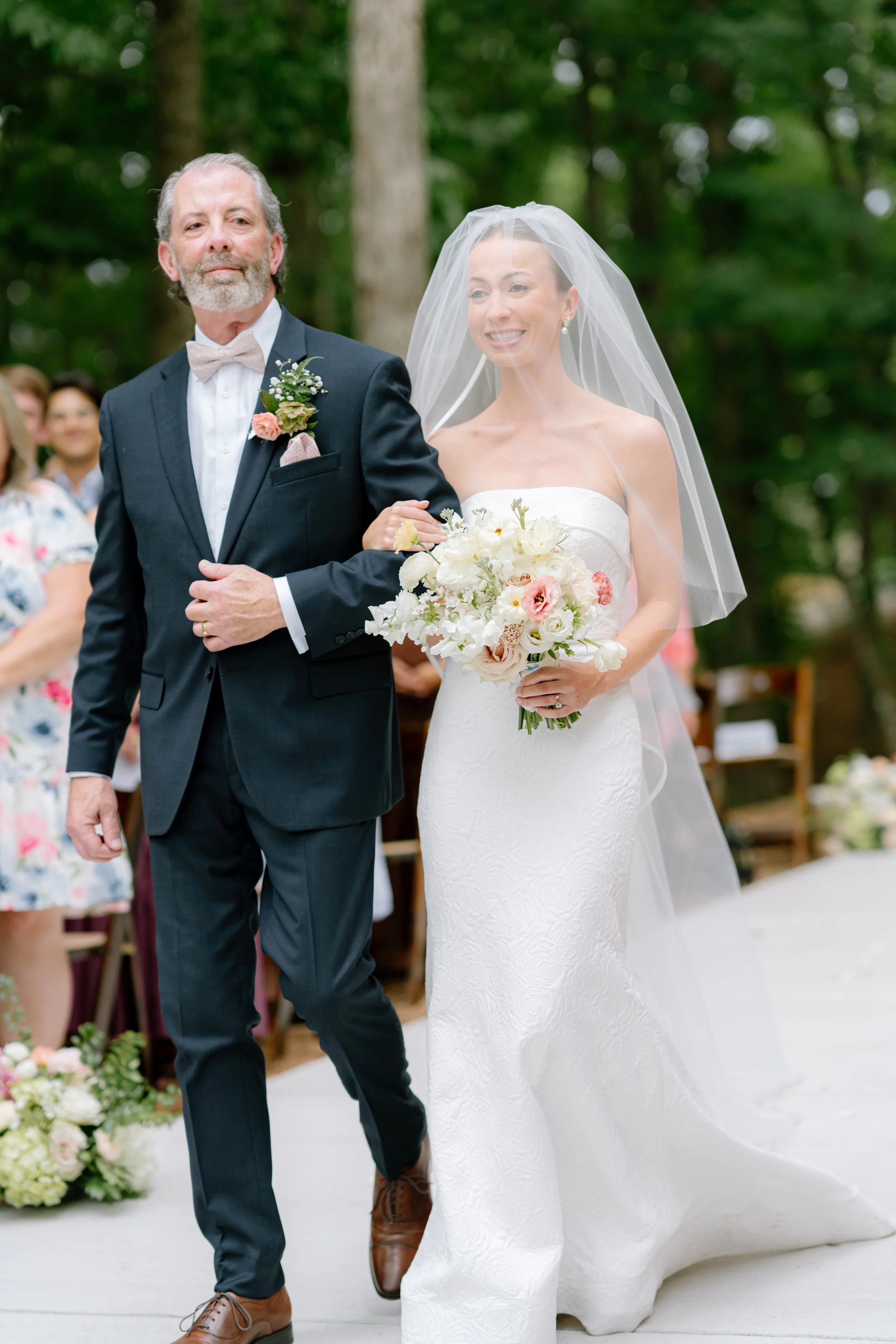 Father walks his daughter down the isle to be married during wedding ceremony in South Carolina