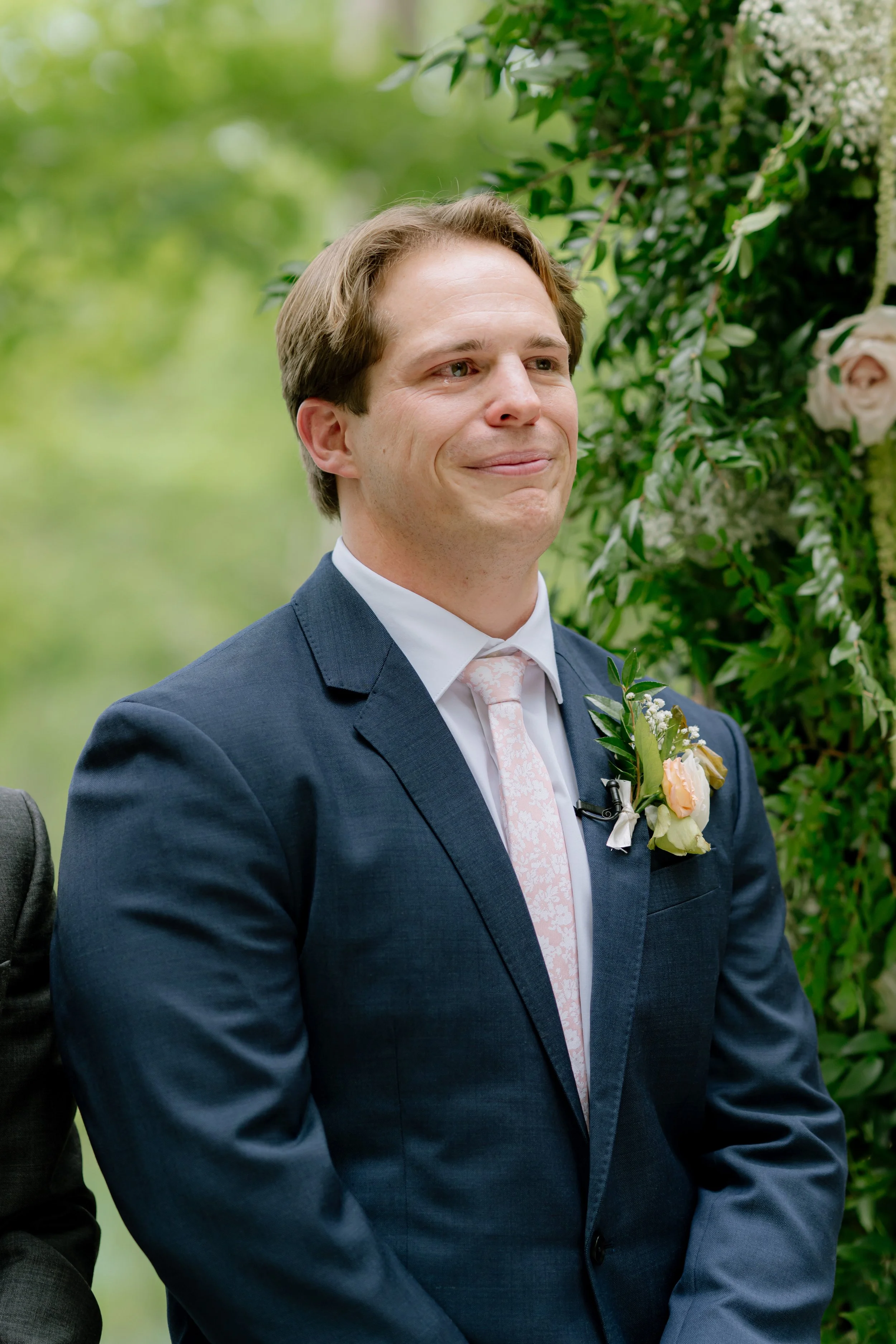Man is emotional as he see his bride coming down the isle in wedding in South Carolina