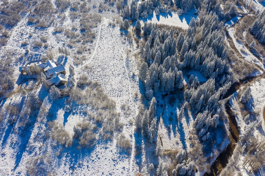 DancingBearRanch_DASH-50_overhead_creek-bridge-home.jpg