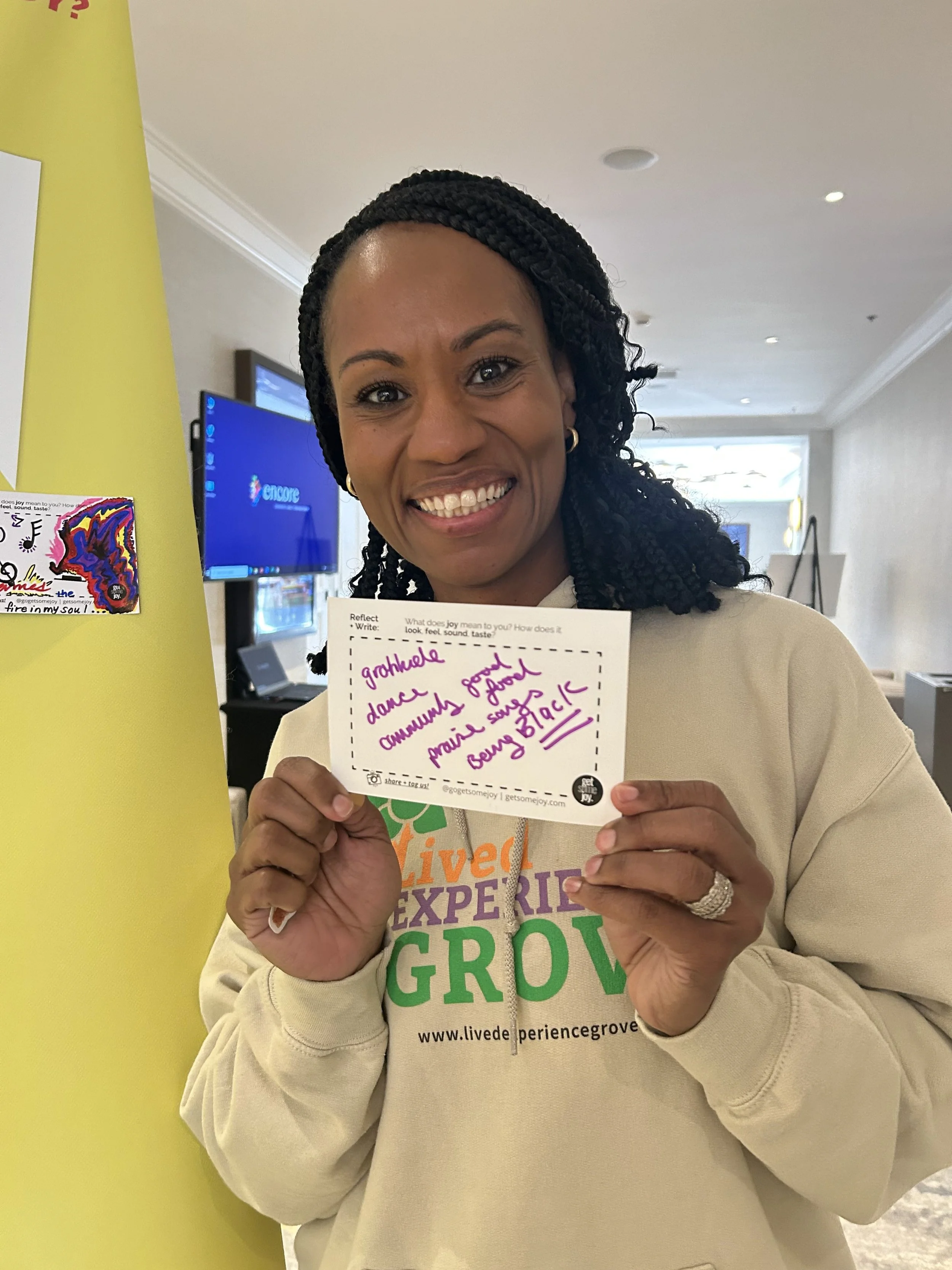 sd black woman holding LT postcard.jpg