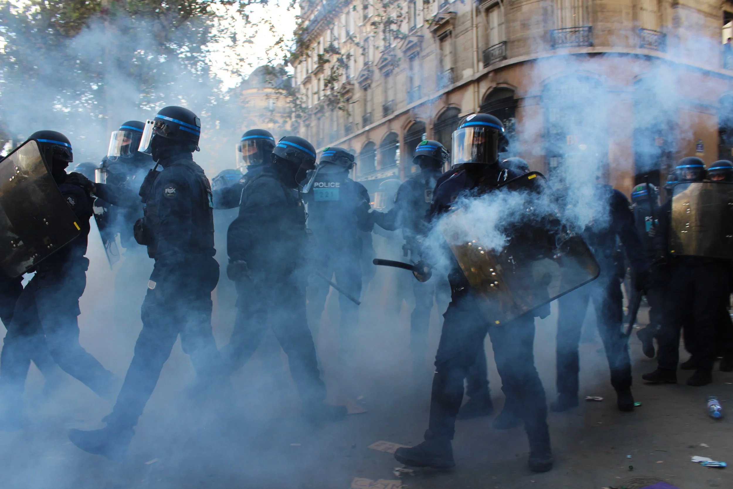 Police fire tear gas toward protesters at Place de la Bastille, Oct. 8