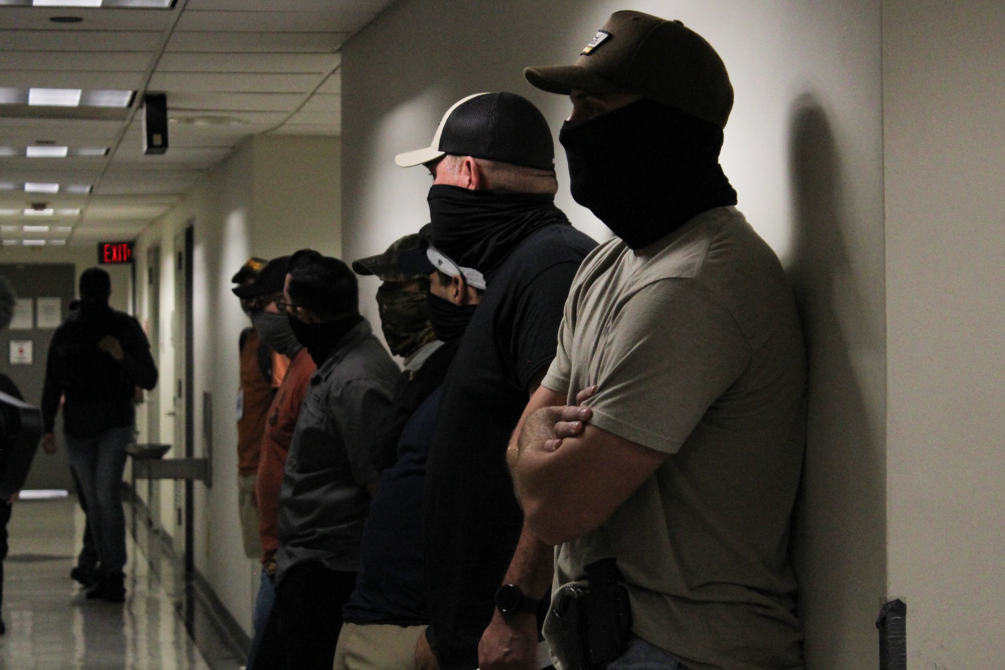 Federal Immigation and Customs Enforcement officers wait outside an immigration courtroom at 26 Federal Plaza, Aug. 25, 2025 (Photo by Sandra Sadek)