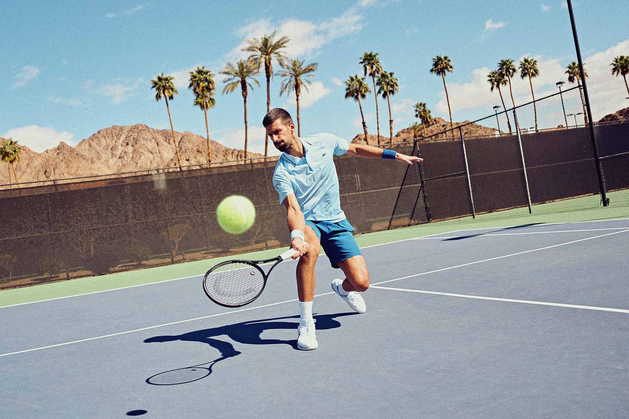 Novak Djokovic training on outdoor hard court tennis