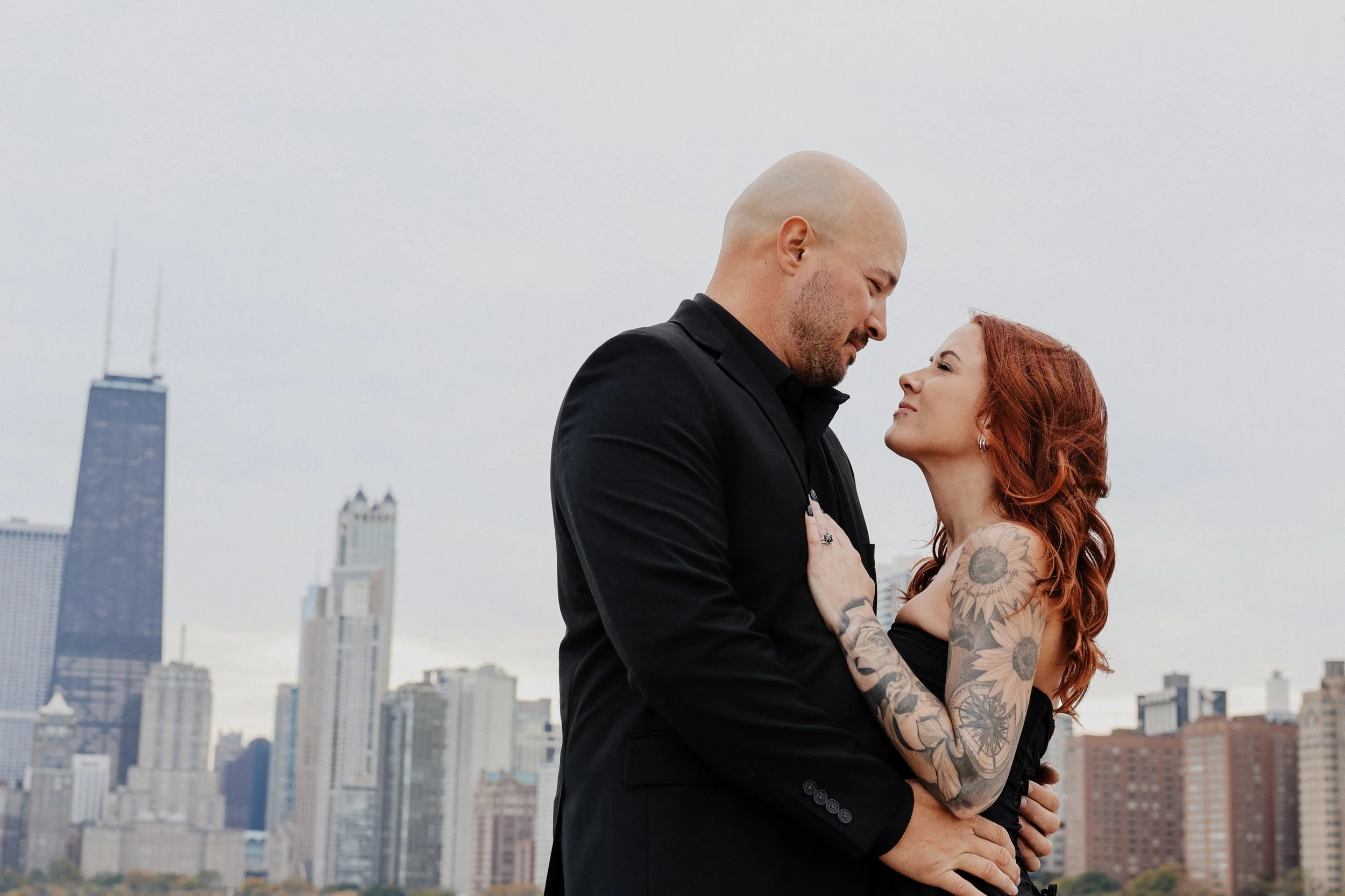 A couple elopes and takes photos along the lakefront in Chicago, IL.