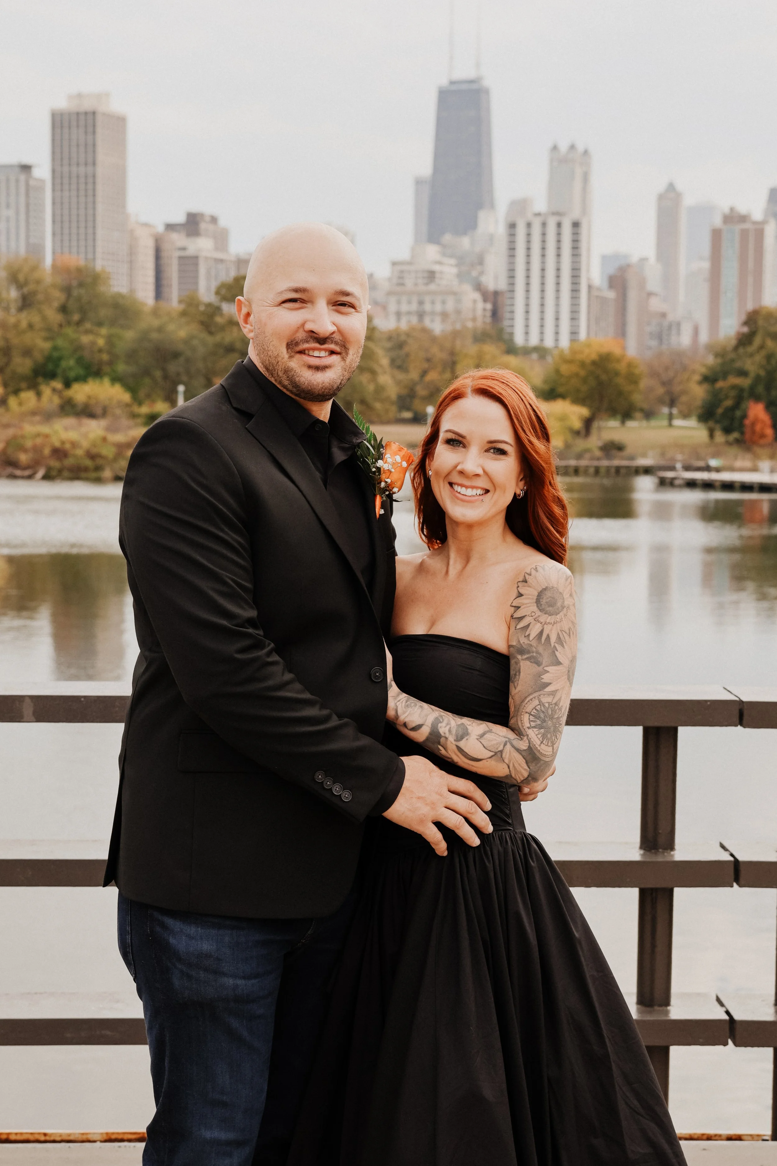 A couple poses for photos after their wedding in Lincoln Park, Chicago, IL.
