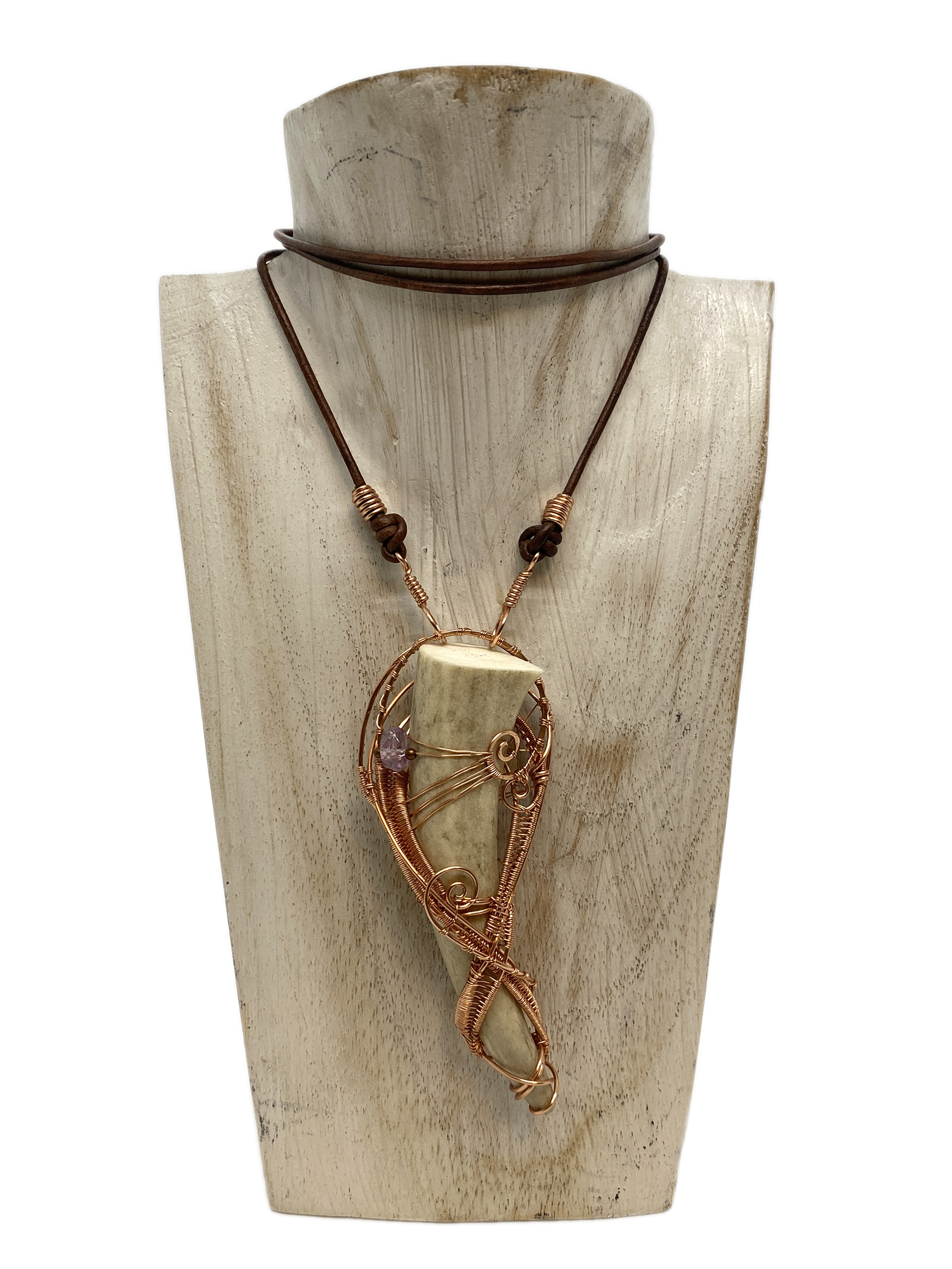 A white tailed Deer Antler, shed naturally has been repurposed in this beautiful copper necklace hand woven and strung on genuine leather.