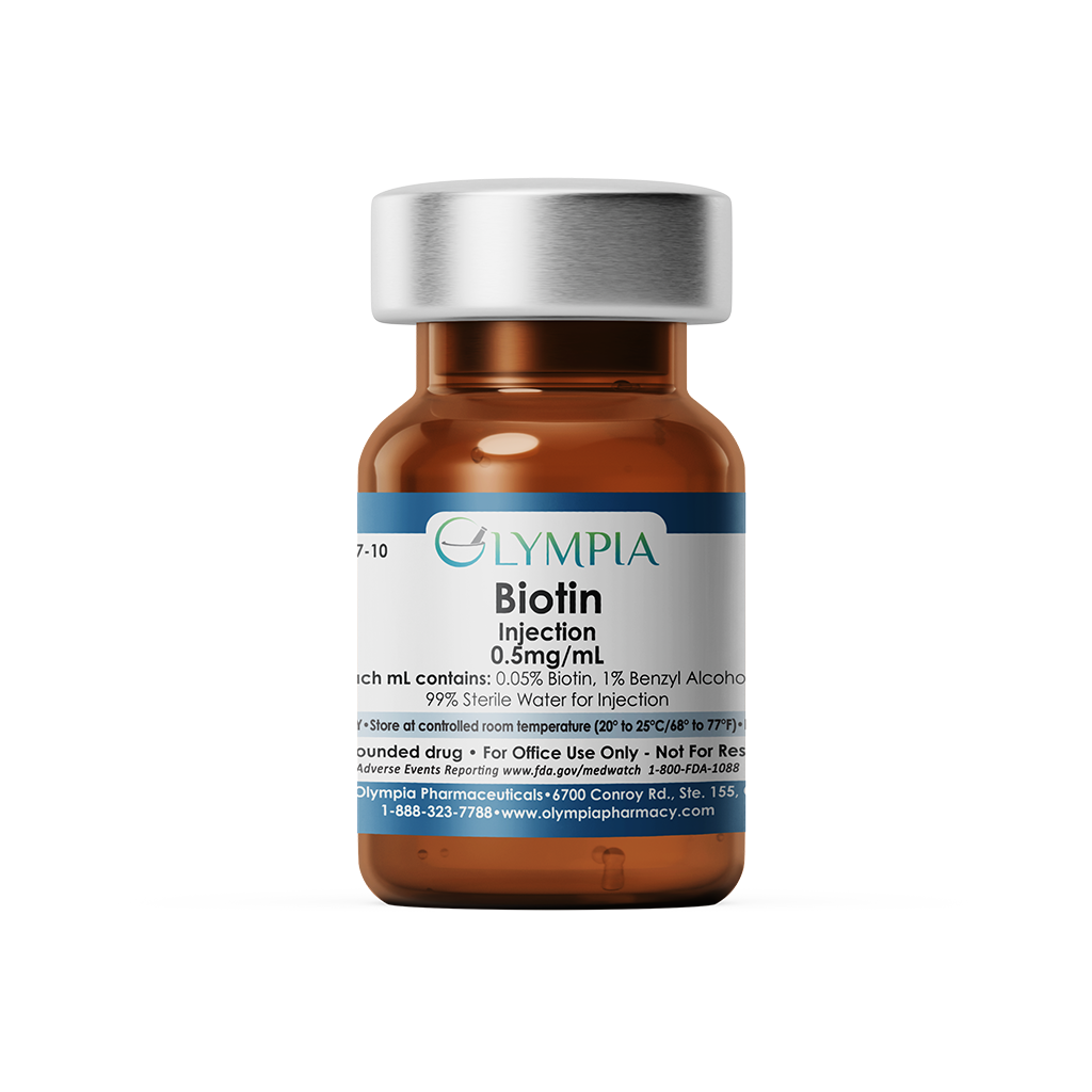 A brown glass vial labeled Olympus Biotin Injection 0.5mg/mL with a silver cap.