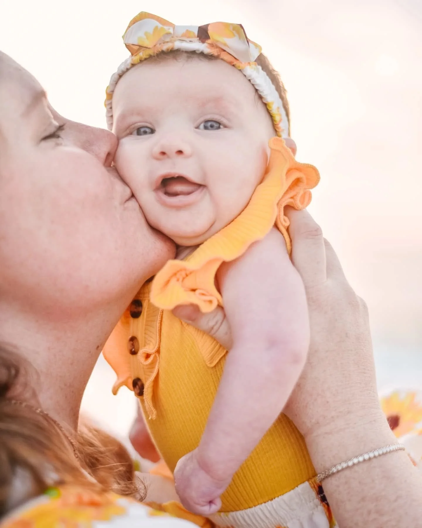 Sweet girl was wide awake and oh so smiley for her first beach sunrise 💛🌻