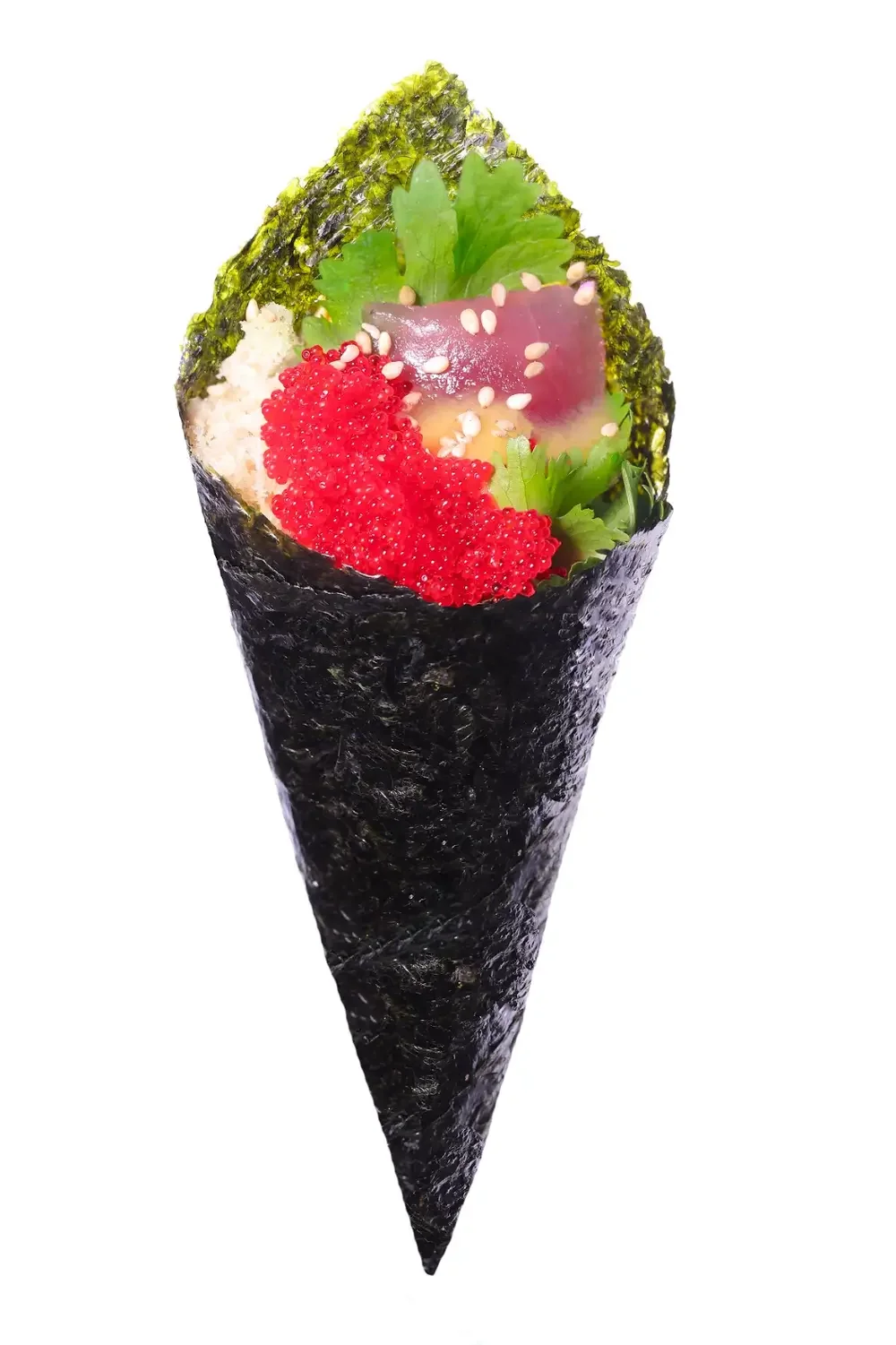 A sushi roll filled with colorful vegetables and wrapped in seaweed, presented on a white plate.
