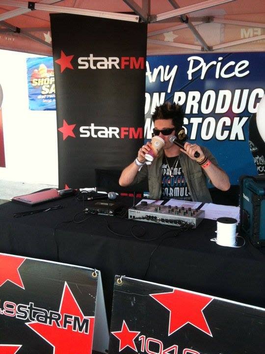 Amos presenting at a live Star FM outside broadcast