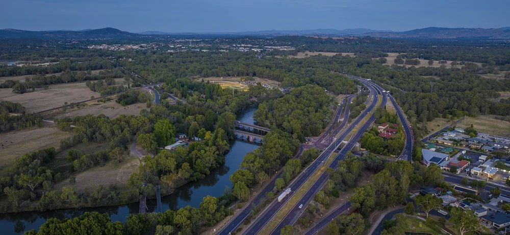 An aerial view of a river and regional landscape