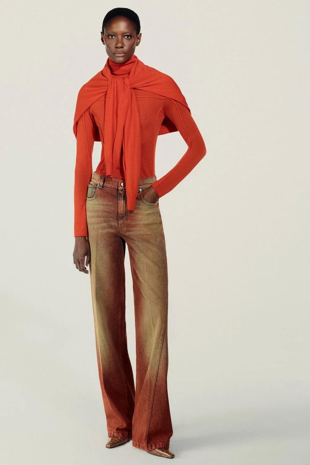 Christopher John Rogers Fall 2026 orange knitwear and denim look