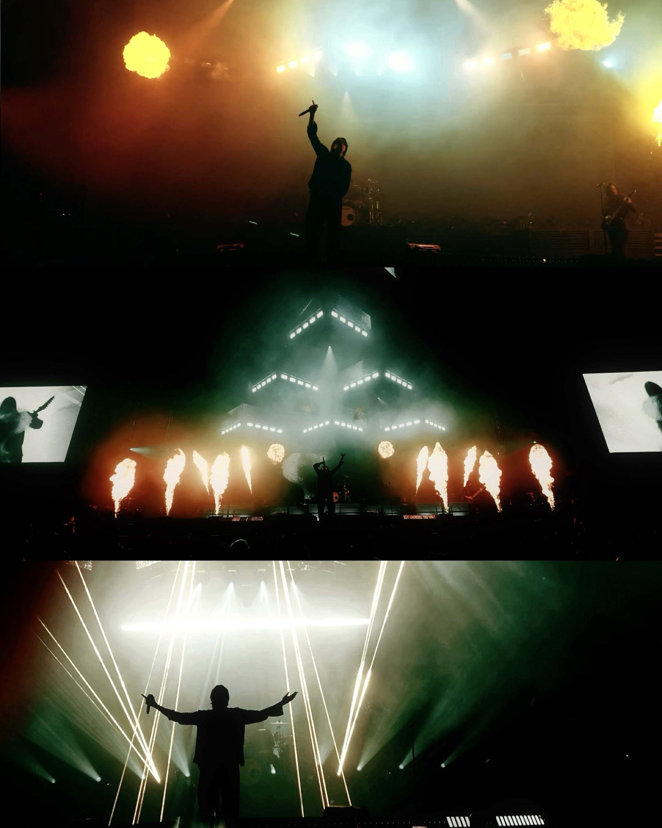 A concert stage with performers, bright lights, and pyrotechnics, including a silhouette of a person with outstretched arms and a microphone, surrounded by colorful and dynamic lighting effects.