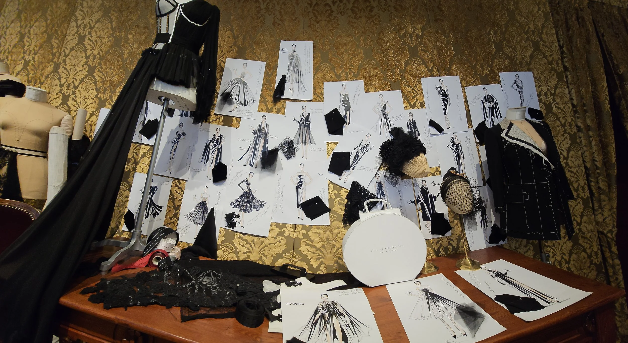 many drawings pinned to the wall