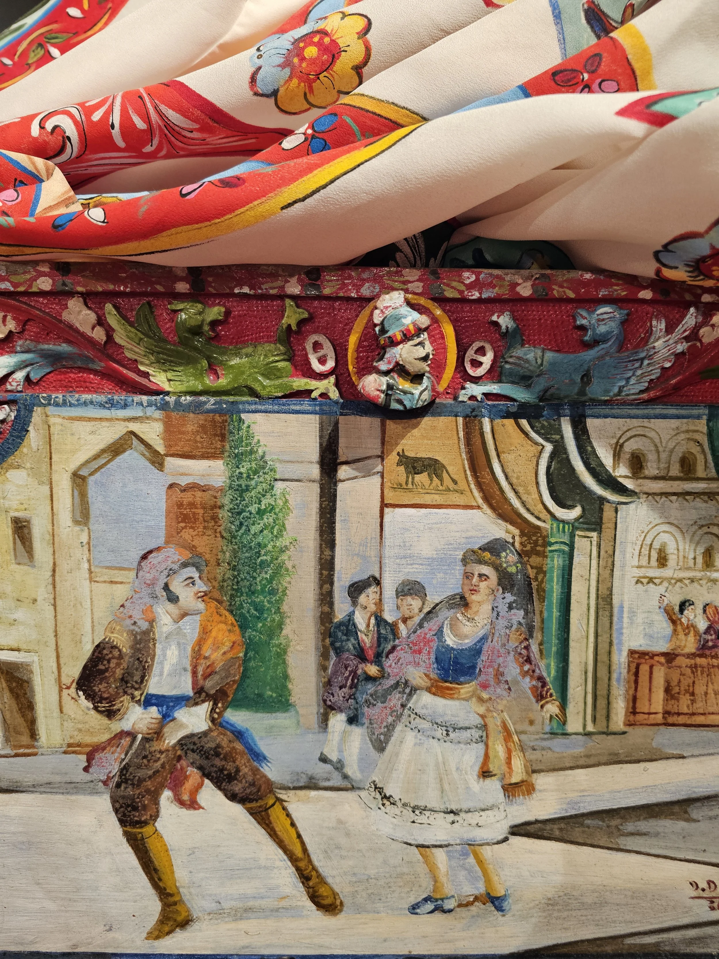 a close up of fabric with a man and woman