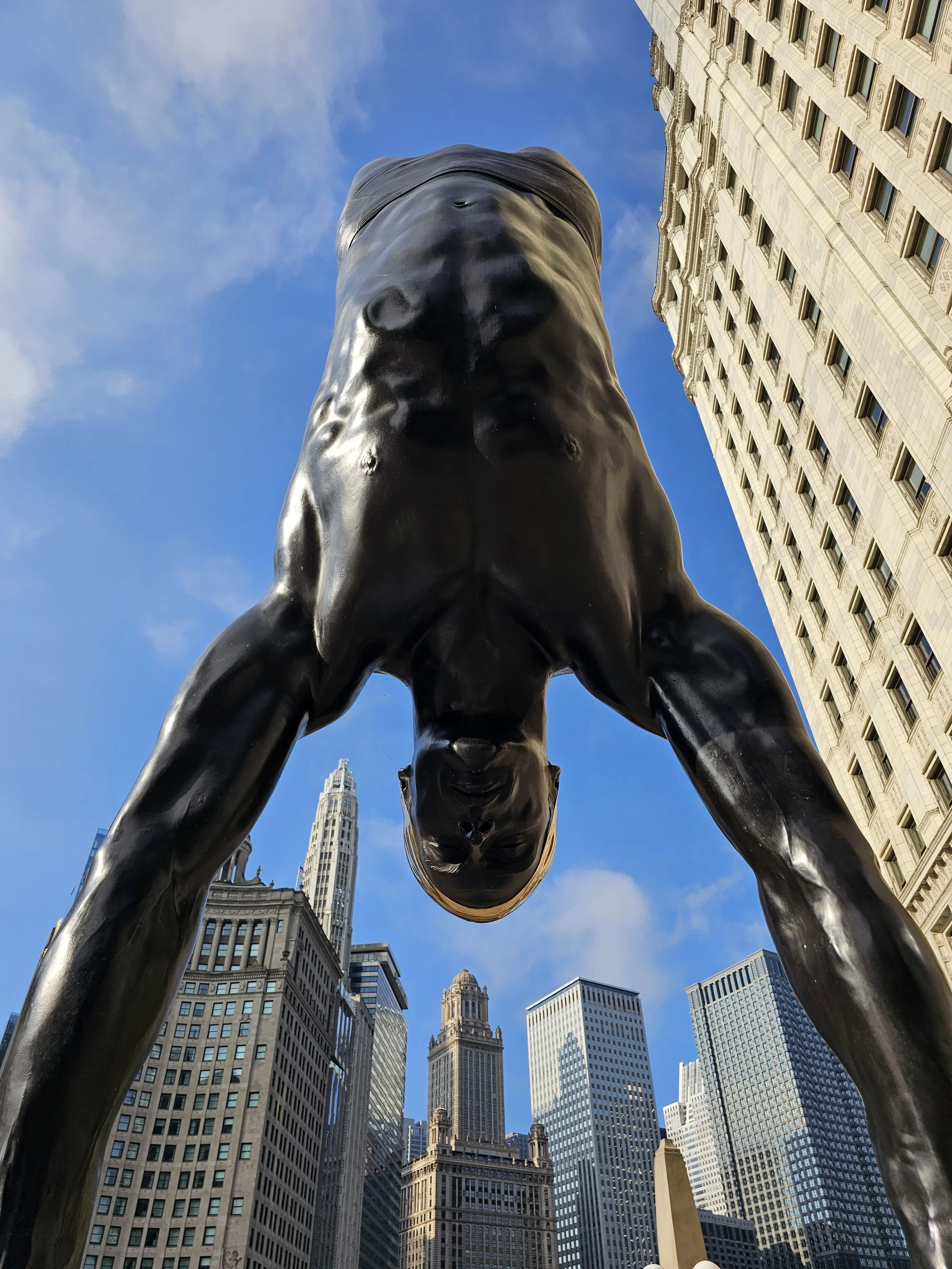 diver statue from below
