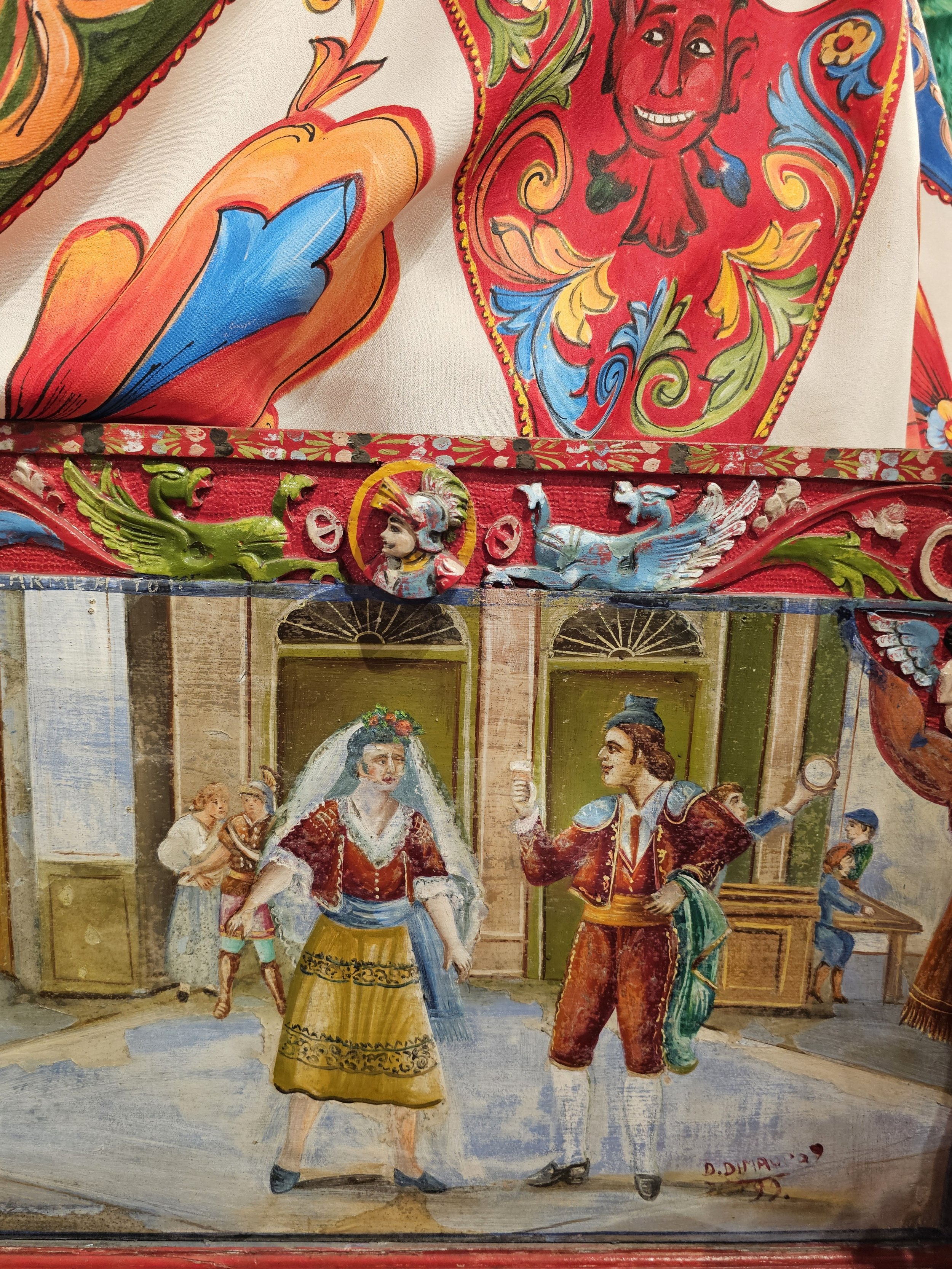 a close up of fabric with two people in the street