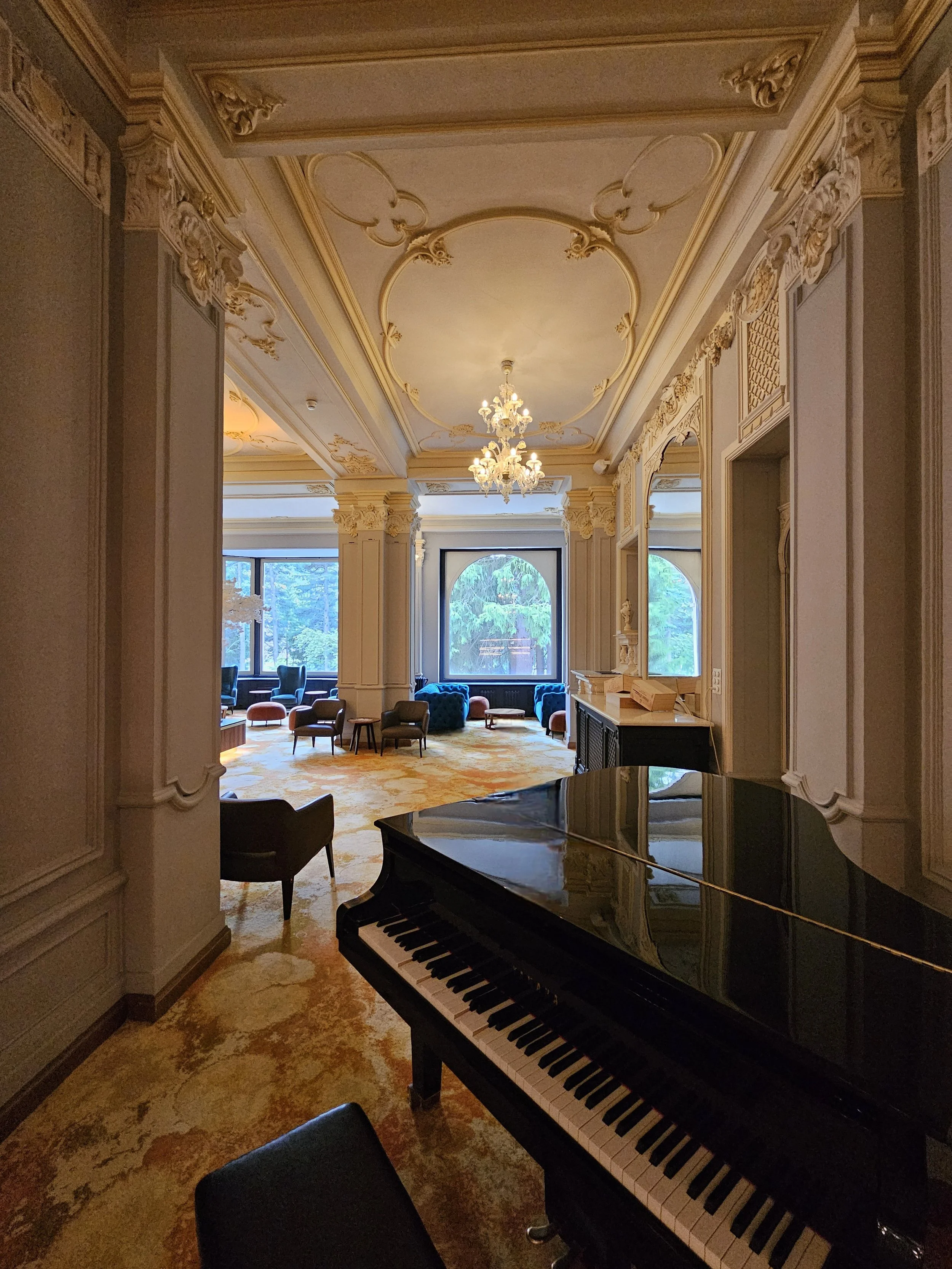 a hotel lobby with a piano