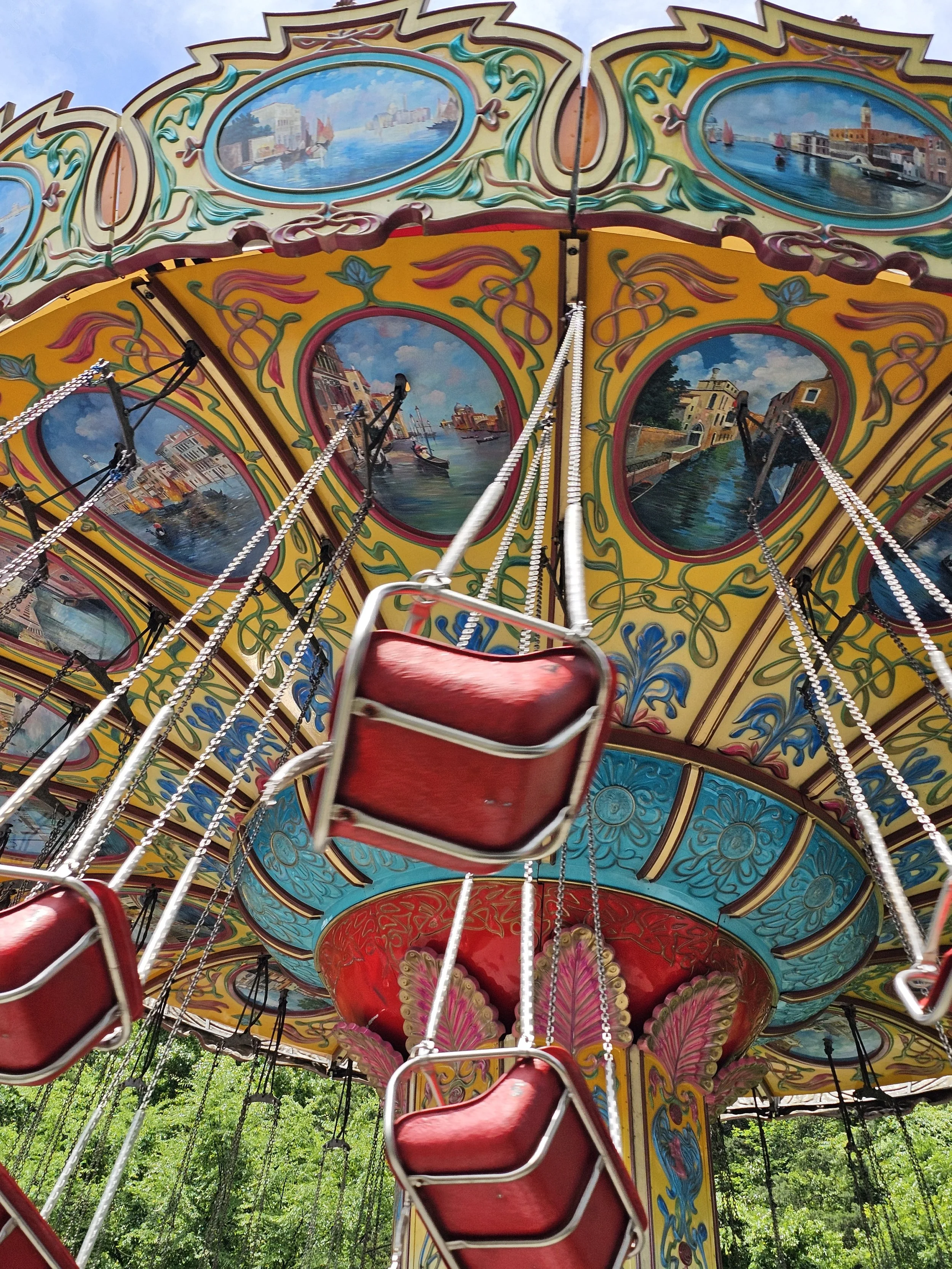 red chair ride in motion close up