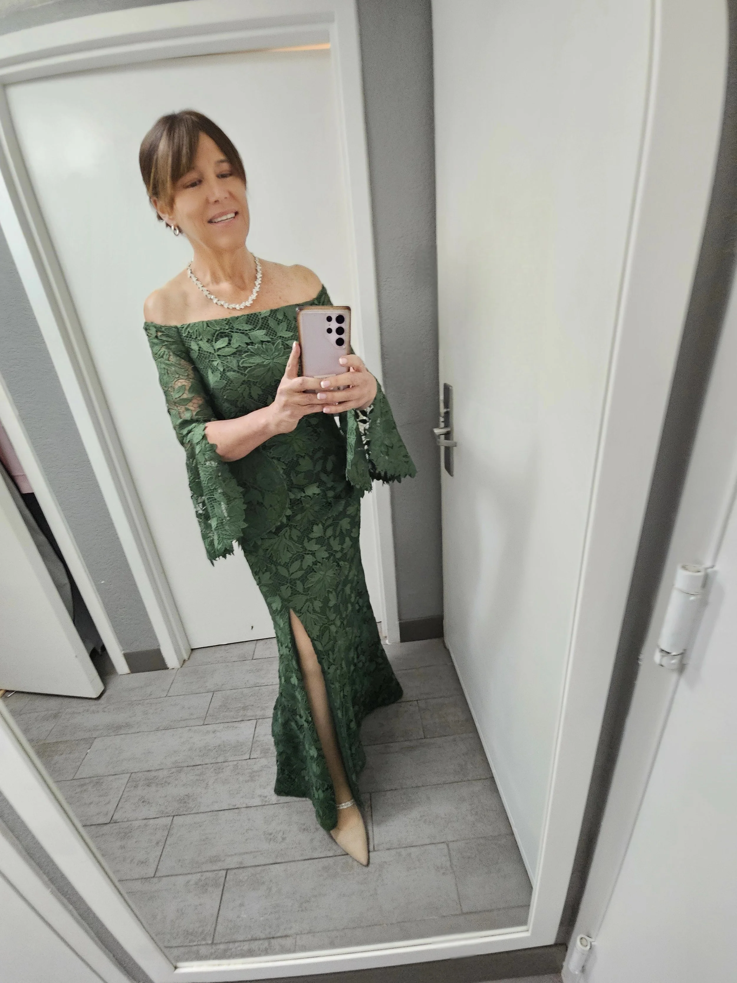 A woman in a green dress