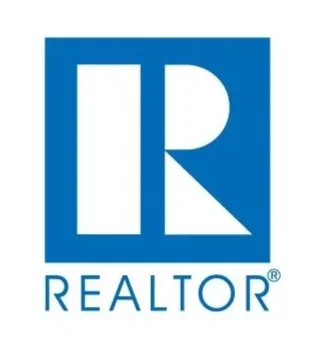 Realtor logo with a blue square containing a stylized white letter R and the word 'REALTOR' beneath it.