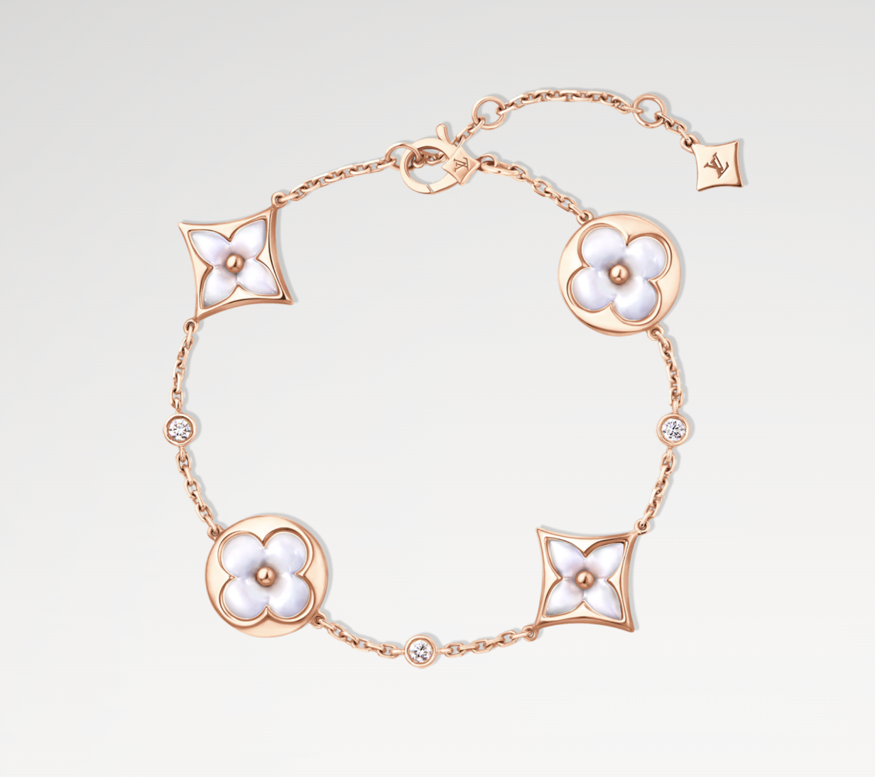 Lắc tay LV Blossom ngọc trai trắng đính kim