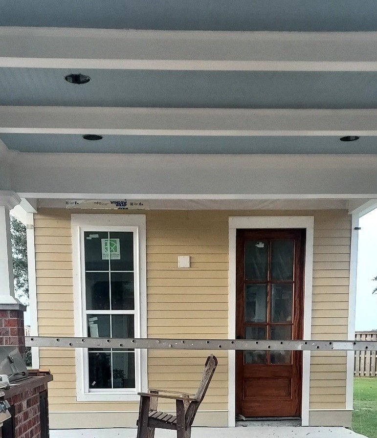 Hardin siding, window, and beaded ceiling accents to include light fixtures.