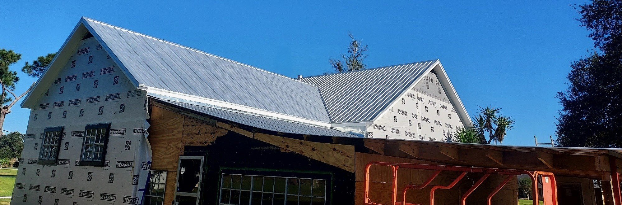 Low profile style corrugated metal roofing. (color: Galvalume)