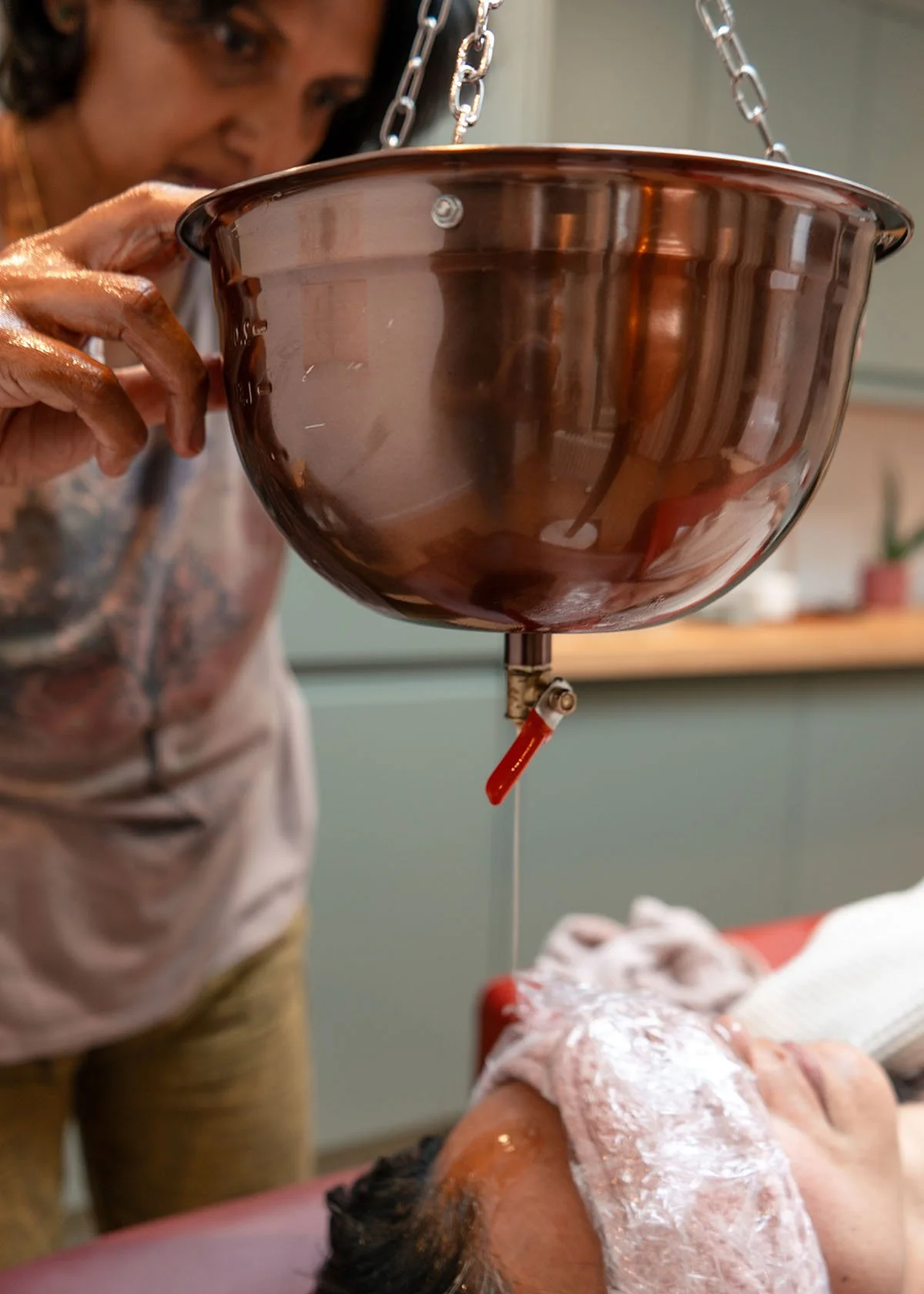 Shirodhara Ayurvedic oil pouring therapy for relaxation and balance