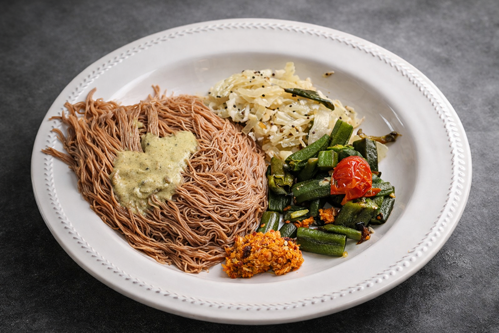 Traditional South Indian meal with idiappam and curries used as part of Ayurvedic diet and lifestyle guidance