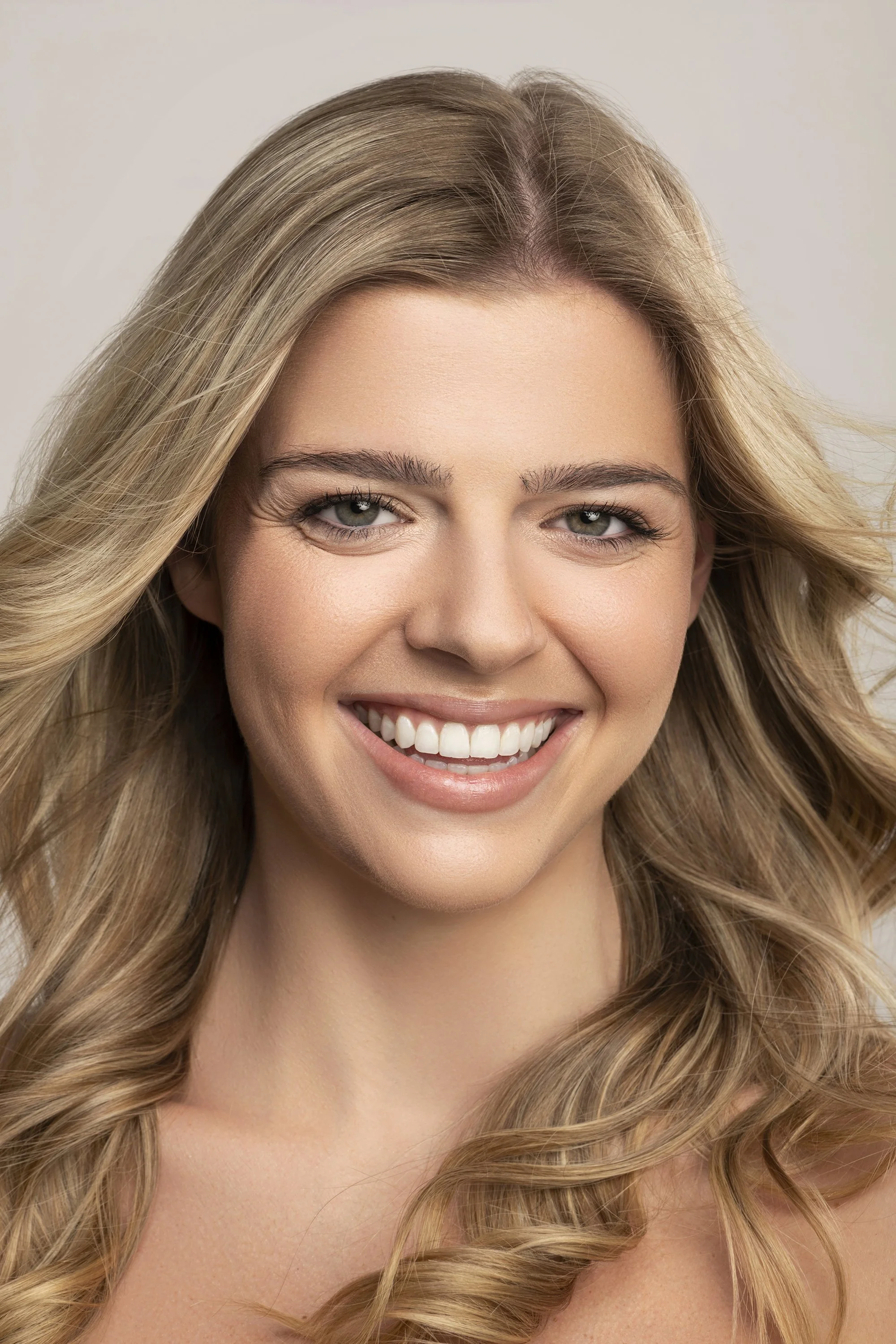 Professional beauty and lifestyle headshot Atlanta studio session featuring Charlotte Lennon model from Forward the Agency photographed by Caitlin Tabilog with clean white background commercial editorial portrait Atlanta Georgia