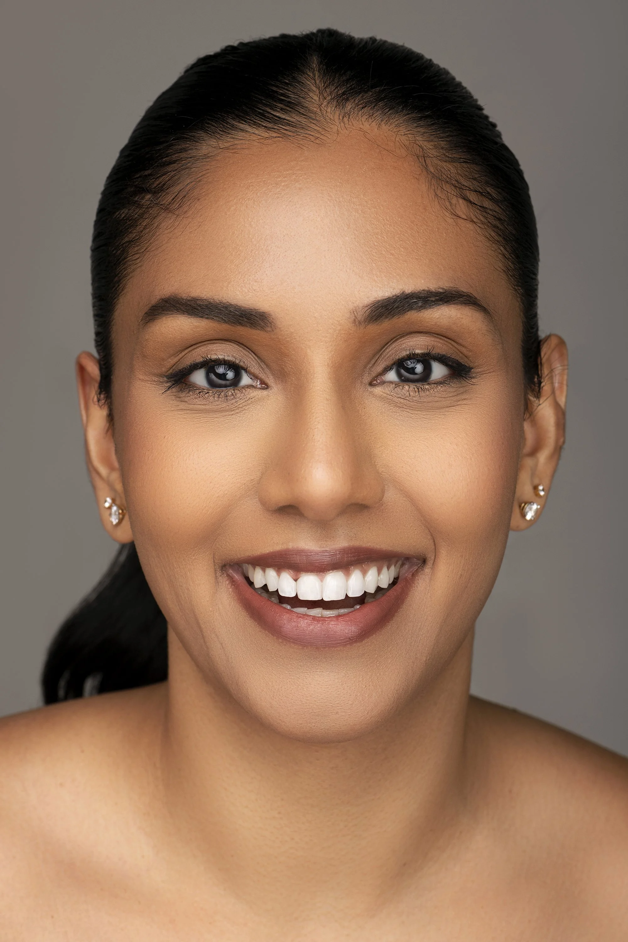 Atlanta beauty photographer Caitlin Tabilog close up beauty portrait of Sahithi model and actor from Forward the Agency natural lighting glowing skin soft expression professional editorial fashion commercial portrait Atlanta Georgia