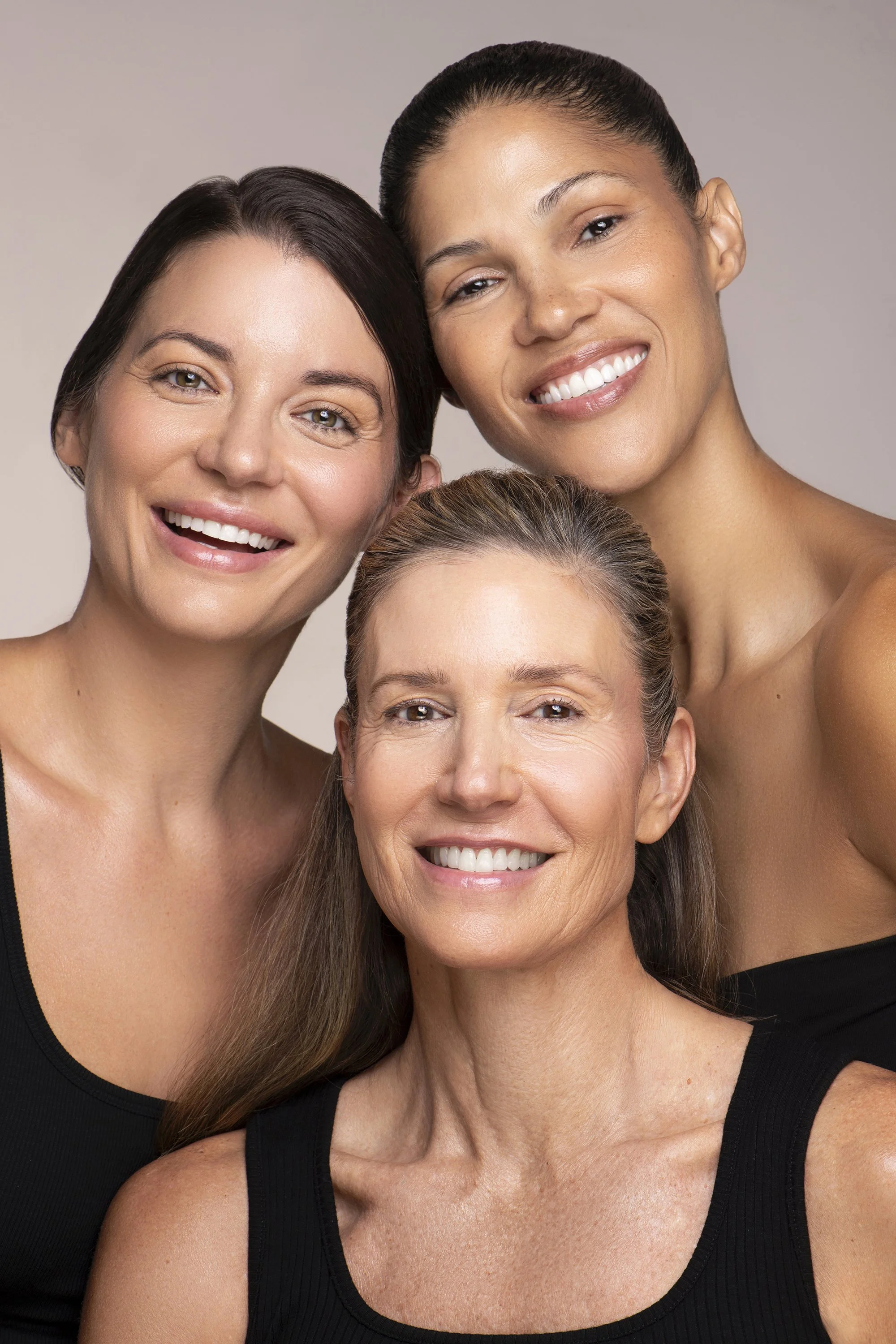  Beauty campaign photography for AYA Skin featuring a female model in her 30s with clean, polished makeup and natural skin texture, photographed by Caitlin Tabilog, an Atlanta commercial beauty and skincare photographer. 
