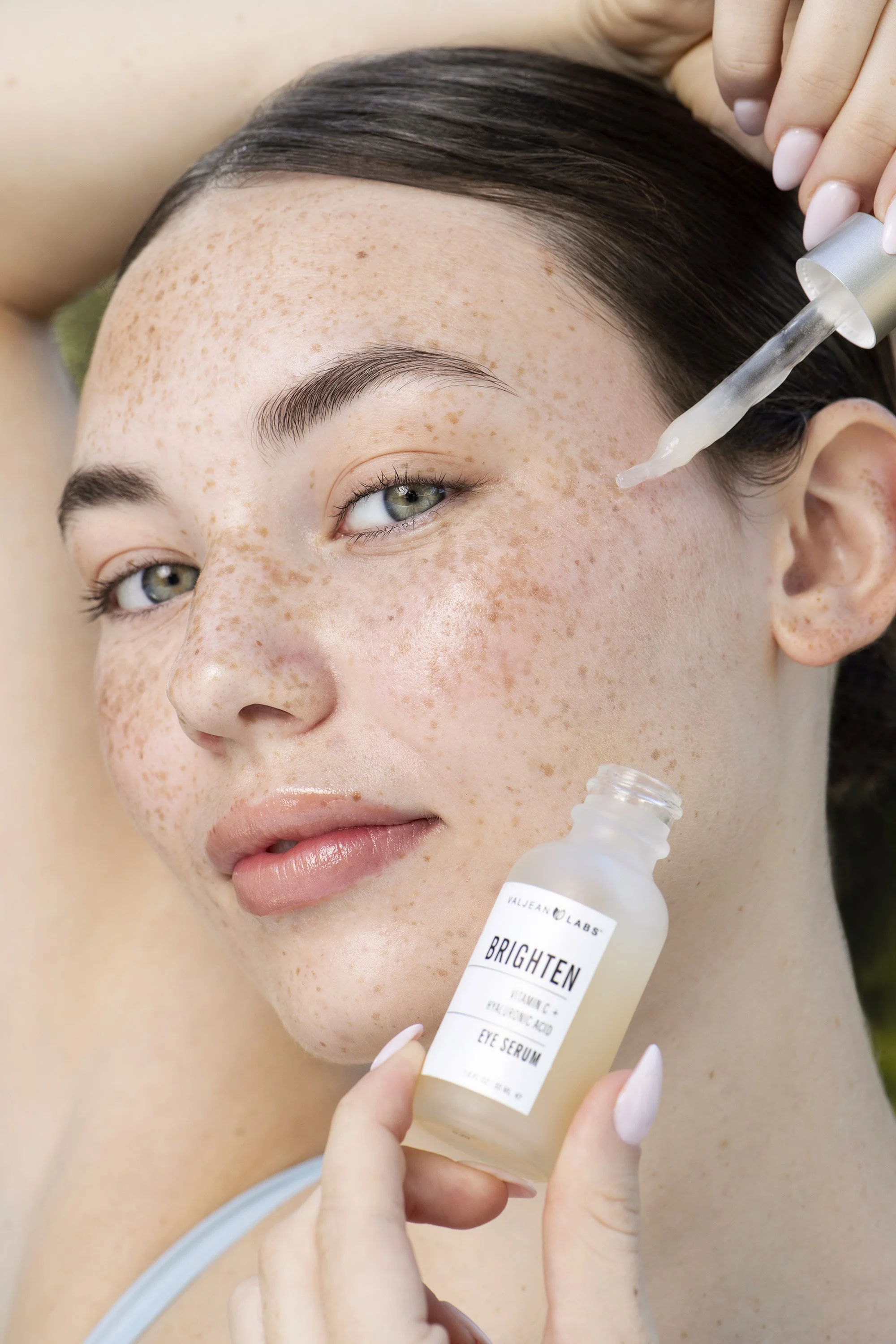 Professional makeup and beauty photography featuring Forward The Agency model Yumi photographed outdoors in Atlanta by Caitlin Tabilog, showcasing polished makeup, luminous skin, colorful fashion, and natural summer lighting.