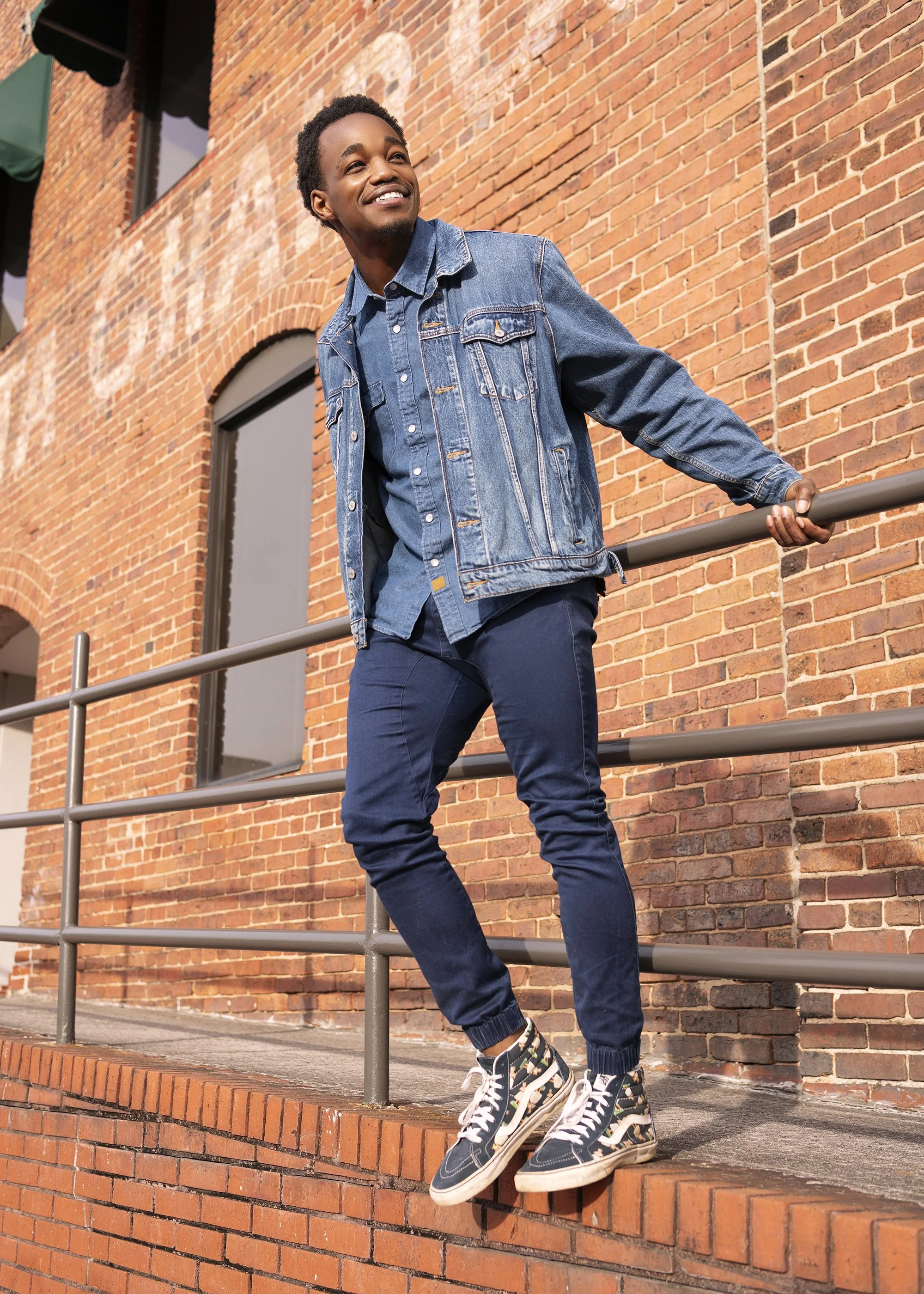 Atlanta commercial and editorial photographer Caitlin Tabilog outdoor lifestyle headshot of Julian Green model actor natural lighting vibrant men’s fashion photography downtown Marietta Georgia