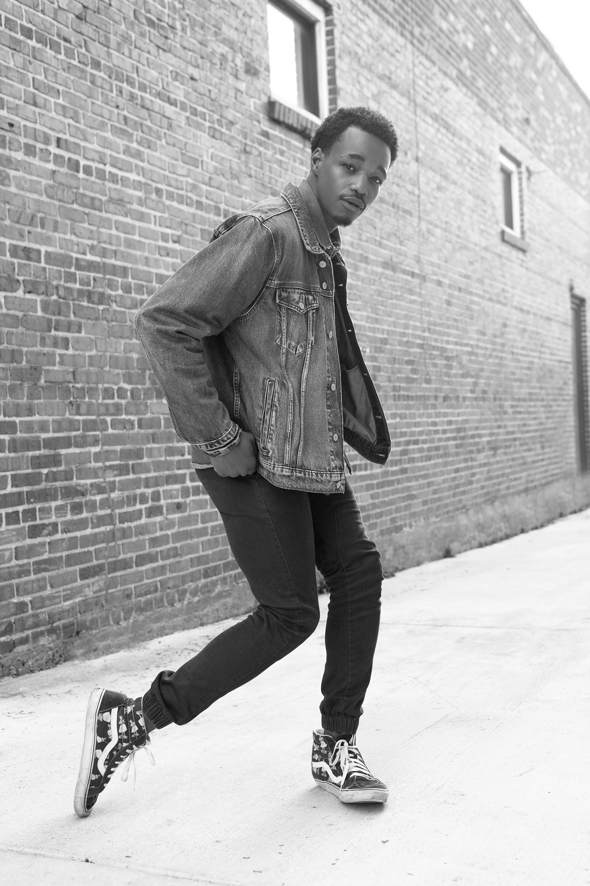 Professional Atlanta beauty and fashion photographer Caitlin Tabilog lifestyle outdoor headshot of Julian Green model actor with natural lighting downtown Marietta Georgia men’s fashion editorial photography