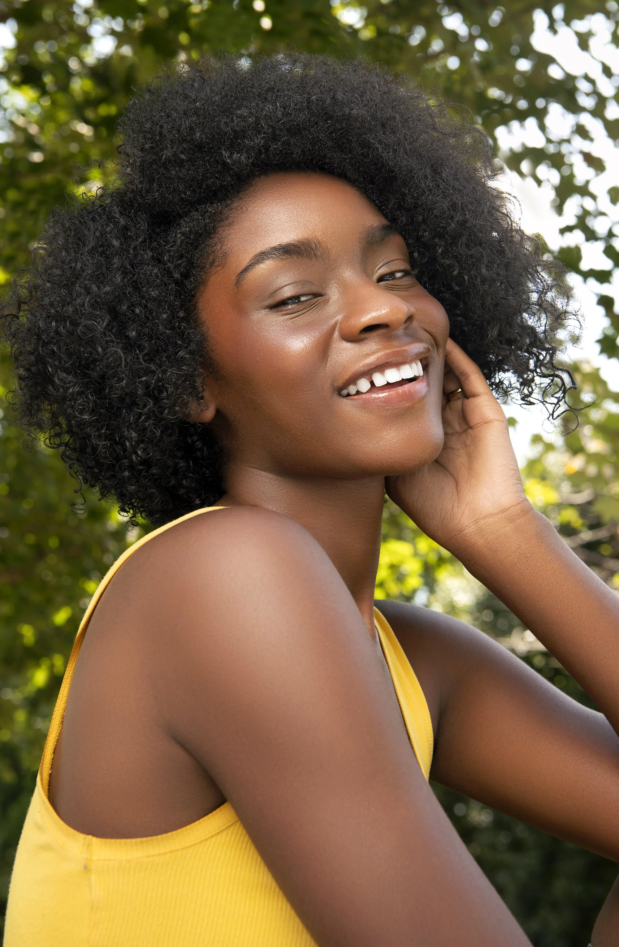 Natural-light beauty photography featuring Forward The Agency model Yumi in Atlanta, Georgia, with colorful summer fashion, polished makeup, luminous skin, and professional hair and makeup by Danielle Onesto.