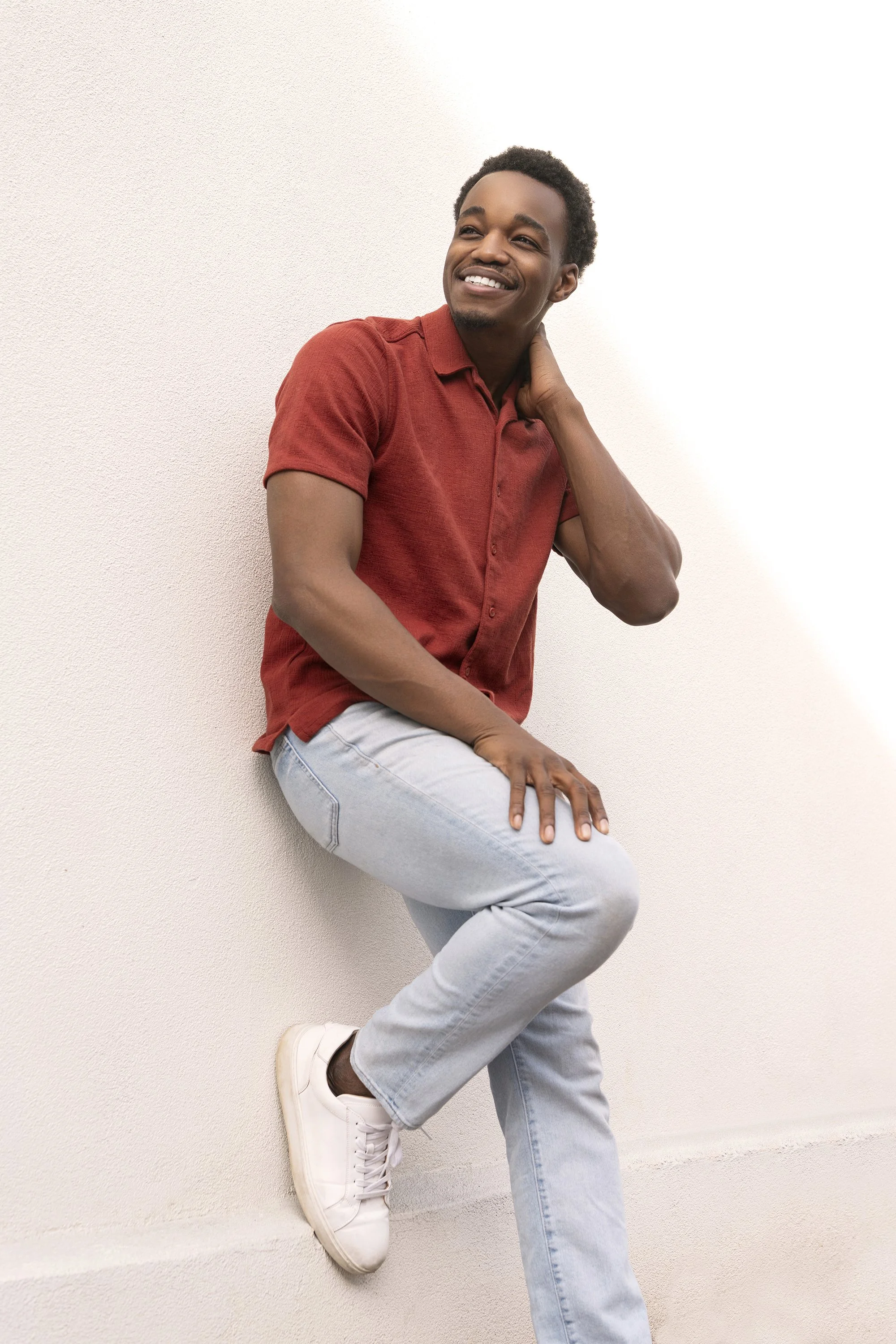 Outdoor editorial and lifestyle photography Atlanta featuring Julian Green model actor natural light vibrant colors commercial fashion portrait captured by Caitlin Tabilog downtown Marietta Georgia