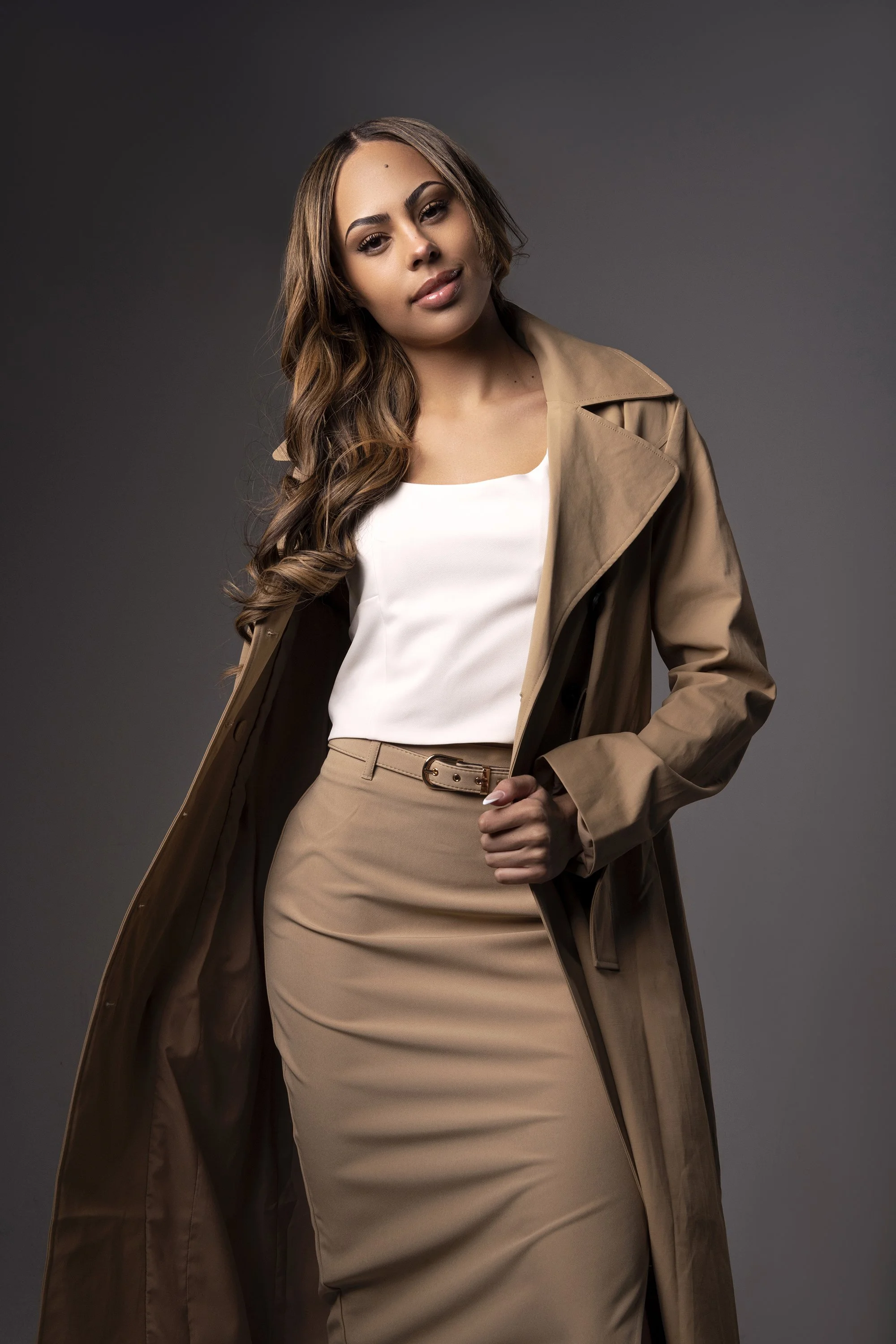 Atlanta editorial studio photography portrait featuring professional model with dramatic lighting clean backdrop and high fashion styling photographed by Caitlin Tabilog