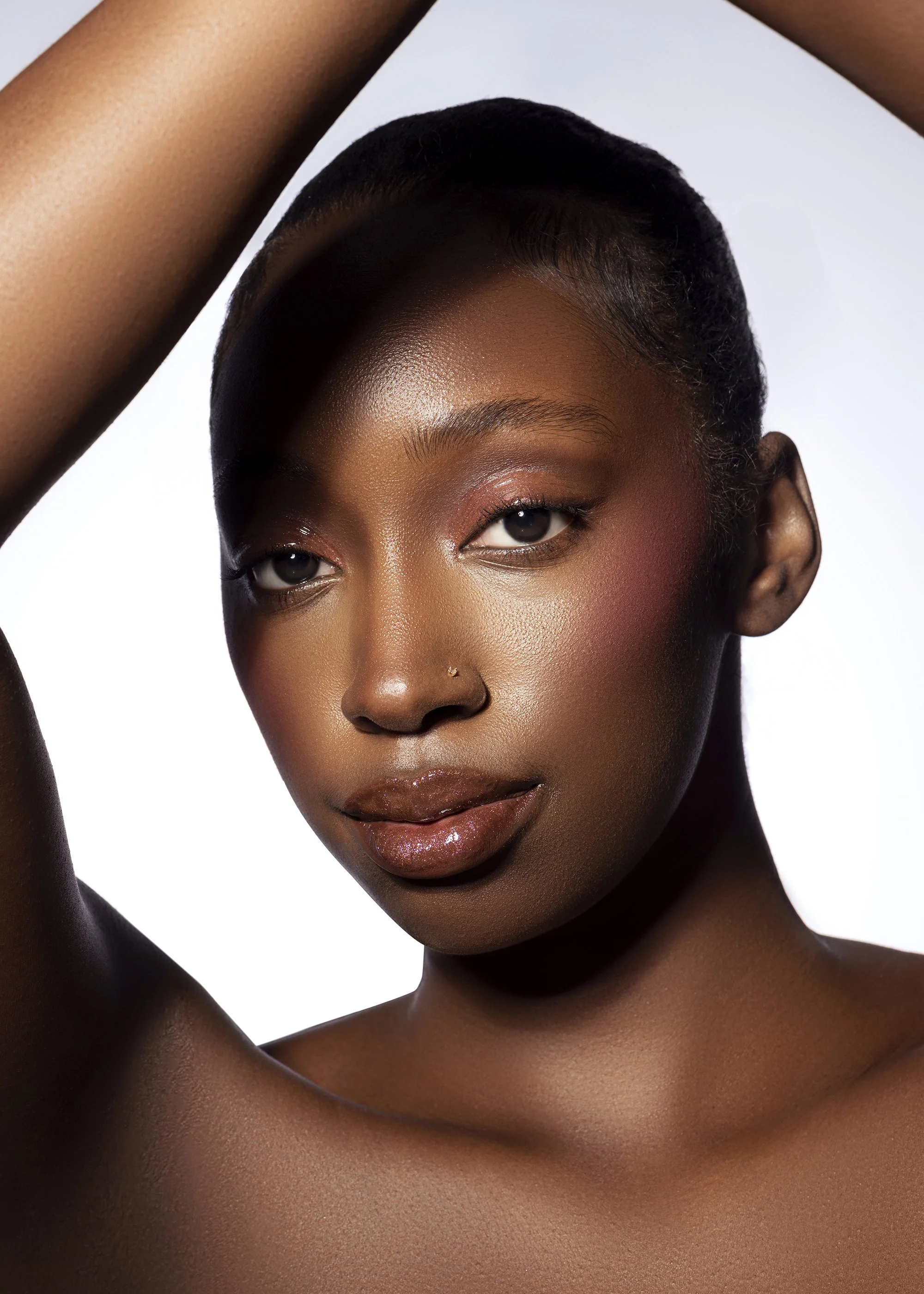 Atlanta beauty photographer Caitlin Tabilog studio portrait of model from AI Model Management with white background for Industry Makeup Academy professional makeup and editorial beauty photography