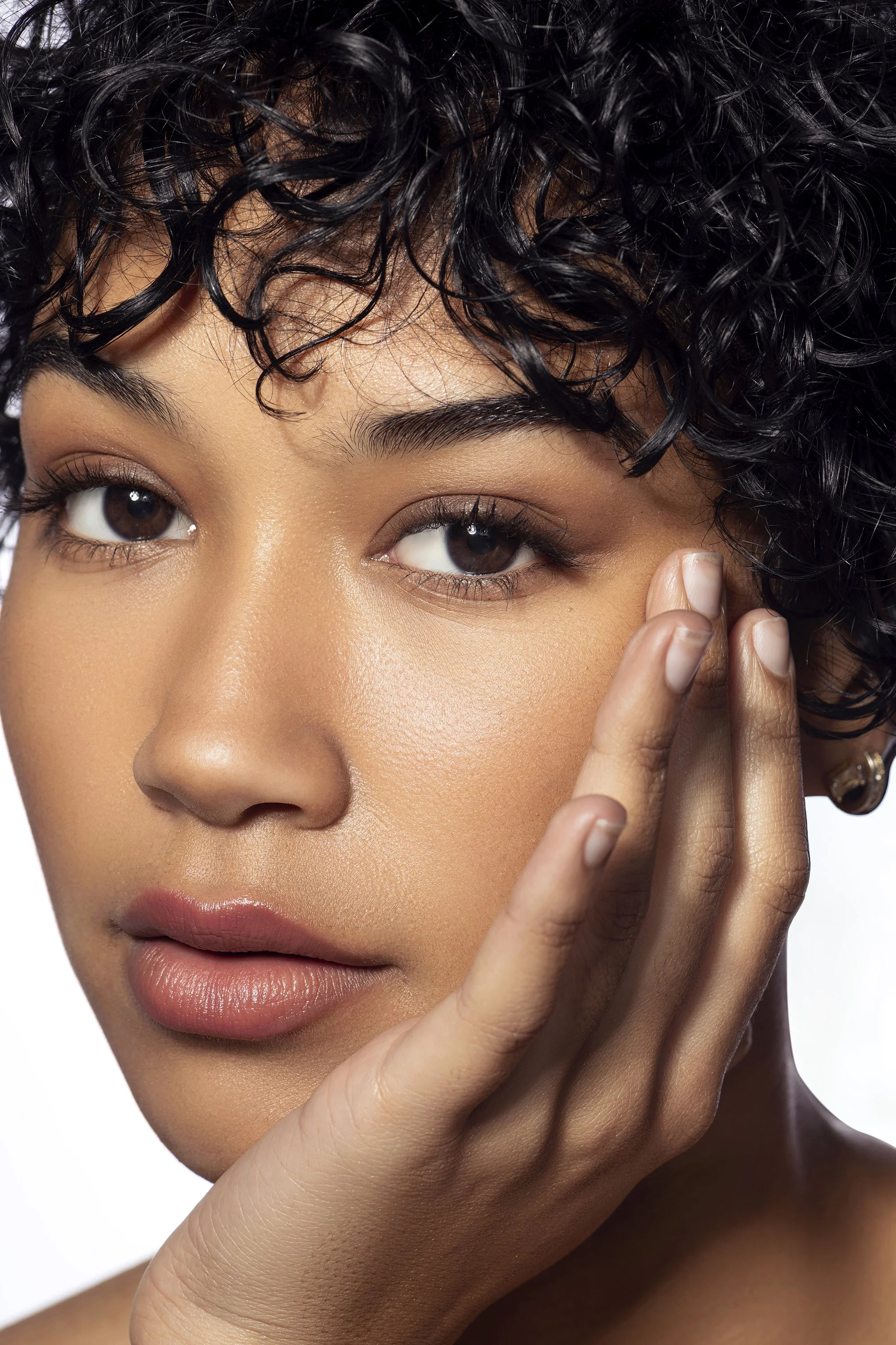 Professional beauty and fashion photography Atlanta studio session with AI Model Management model for Industry Makeup Academy captured by Caitlin Tabilog editorial commercial white background