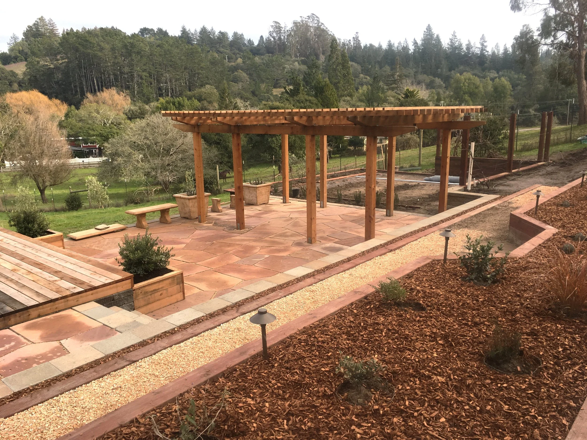 Retaining walls arbour deck and patio.JPG