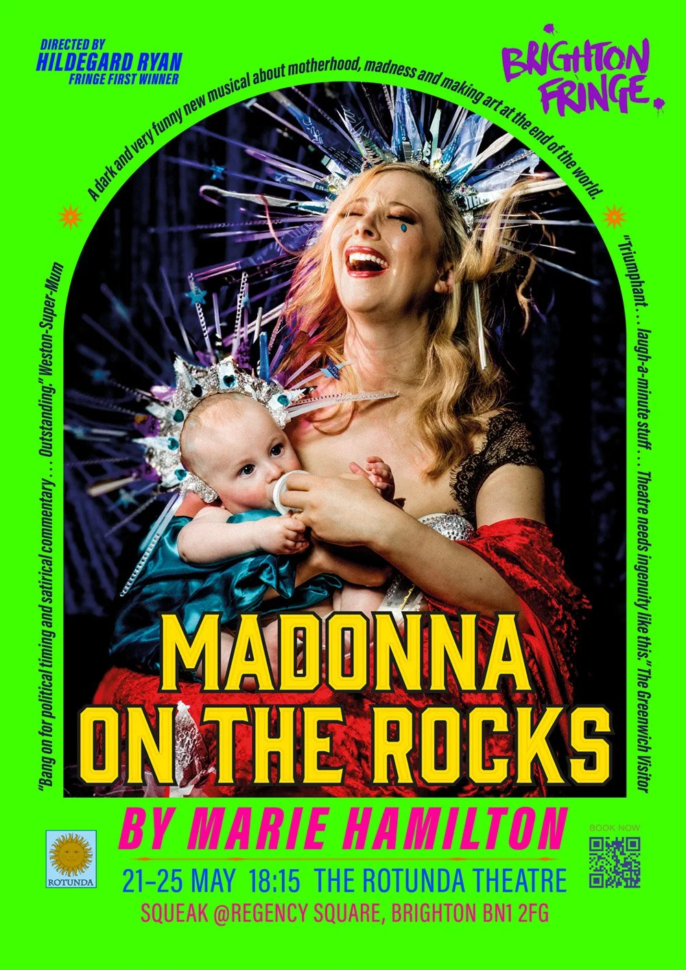 Poster for the musical 'Madonna on the Rocks' featuring a woman smiling with her eyes closed, wearing a spiked crown, holding a baby in a matching crown, both dressed in vibrant costumes, against a colorful background.