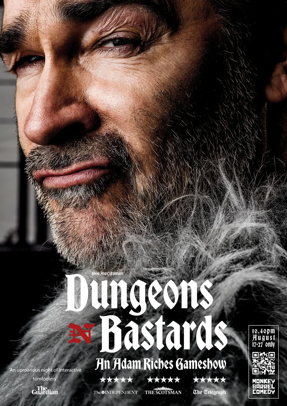 Close-up of a man's face with a confident expression, gray beard, and mustache, set against a dark background with promotional text for a show titled 'Dungeons n Bastards' featuring Adam Riches.