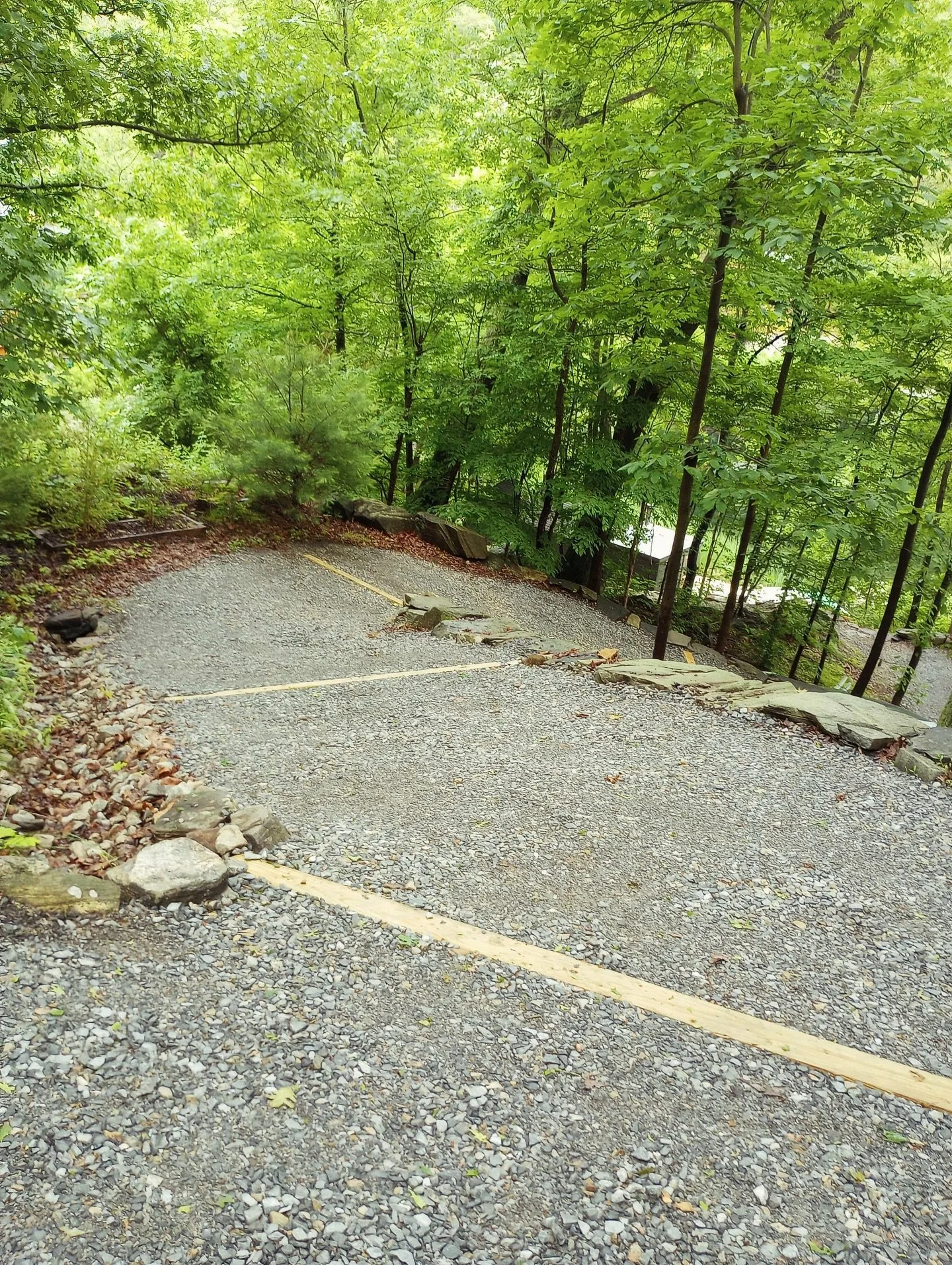 The trail holds its shape when we listen. Rain cuts down. Gravel slides. But a simple water bar&mdash;a line in the earth&mdash;catches the rush, turns it aside. No concrete, no pavers, no noise. Just slope, stone, and care.
This is appropriate tech: