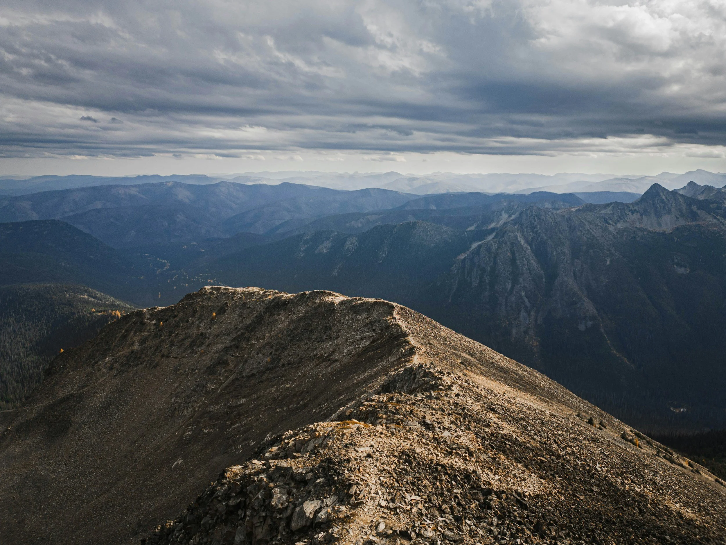 [Image Description: Overview of deep brown valleys and mountains.]