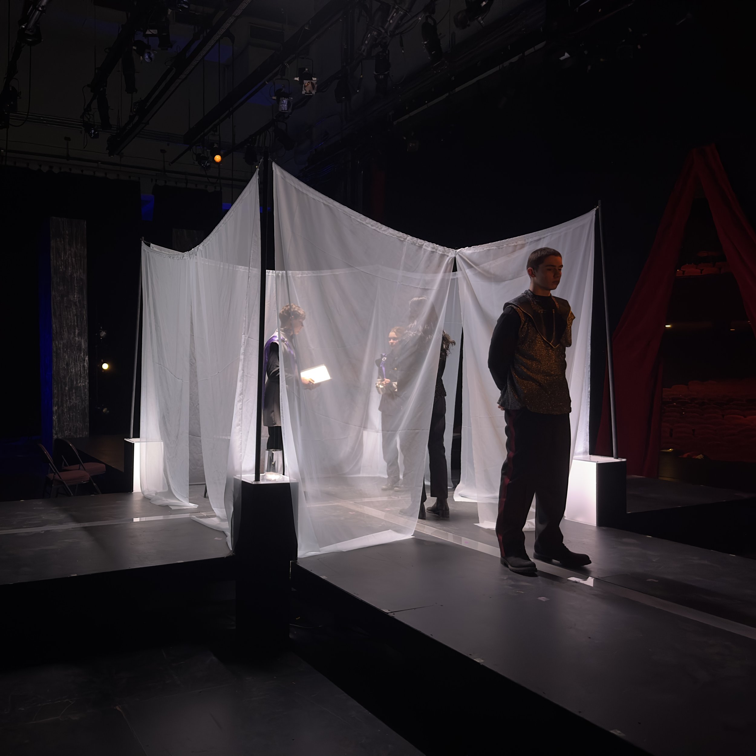 Act 4, Scene 3: A tent made of semi-transparent fabric was set up in the middle of the stage; This scene was lit with top light and shin light